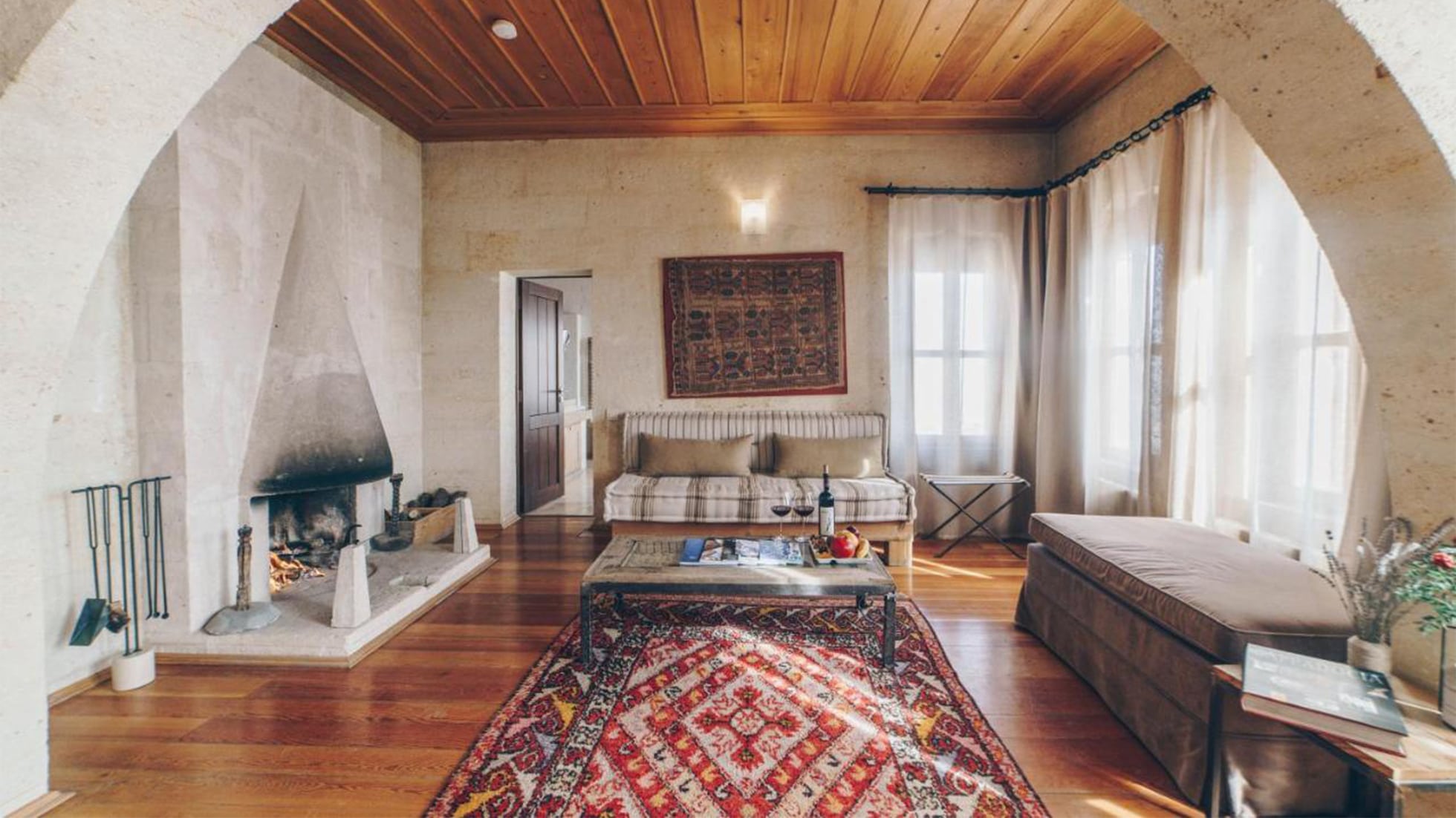 collectible interior design with mid-century modern furniture and vintage rugs