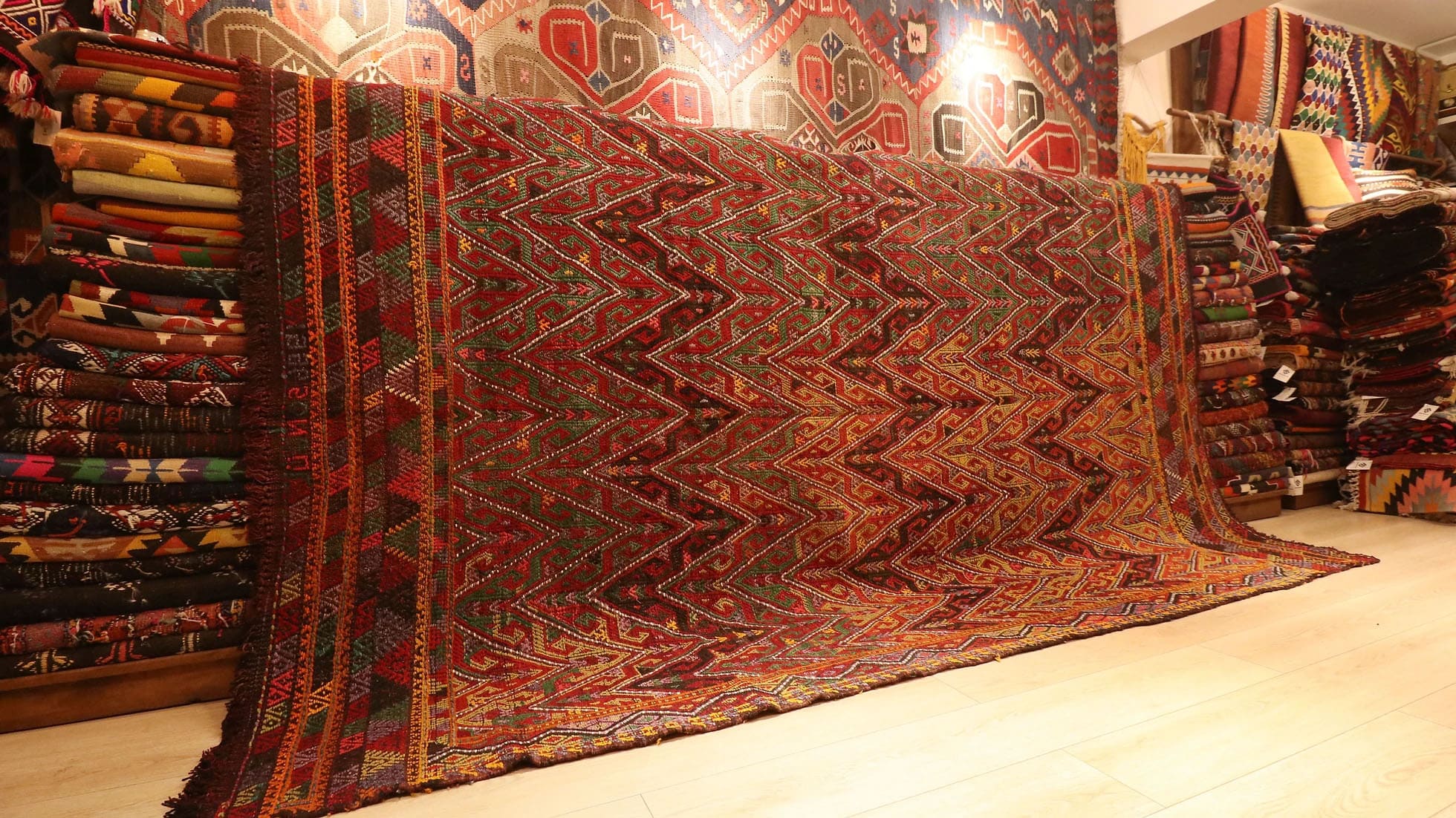 vintage Kurdish rustic cicim kilim rug in earth tones by Kilim Couture NYC