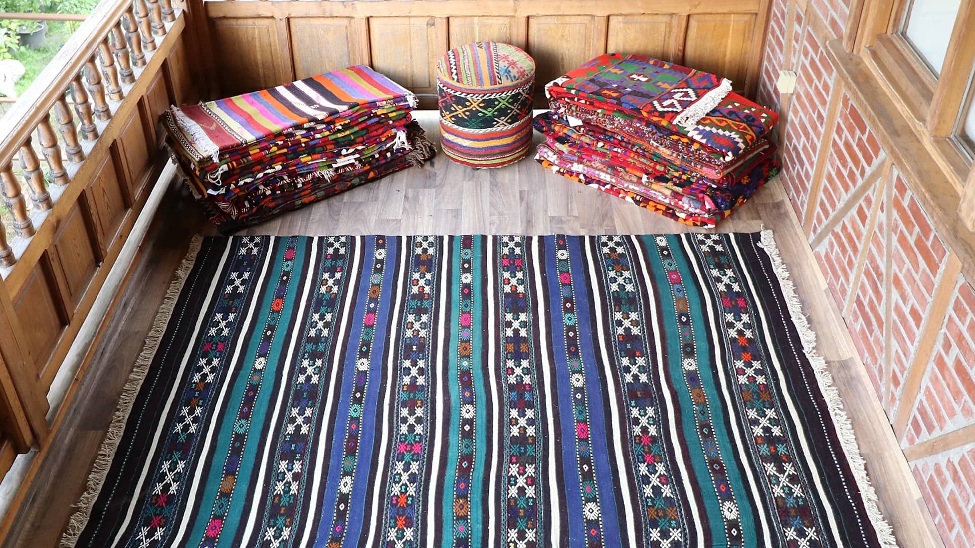 mid-century geometric vintage kilim rug in blue and green with black and white stripes