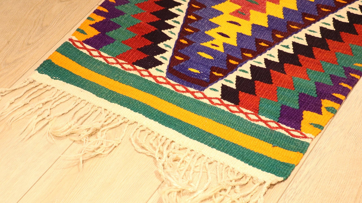 hand-knotted small area kilim rug in vivid and vibrant color hues