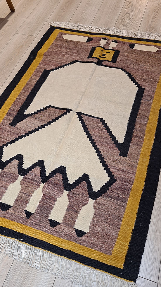 Modern Turkish rug with mid-century abstract design, incorporating tribal motifs in gold and black.