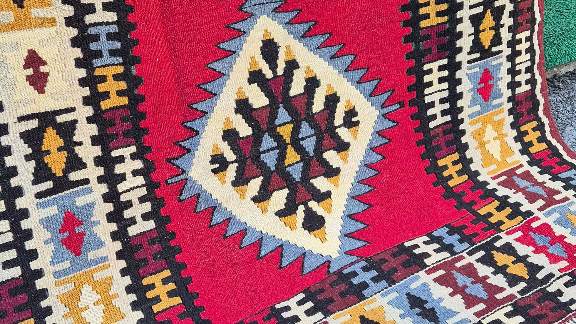 Handcrafted wool-cotton carpet from Uşak Turkey with lhistoric Anatolian motifs