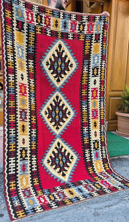 Luxury Oushak kilim rug 4x6 in crimson and earth tones, ideal for living room or office décor