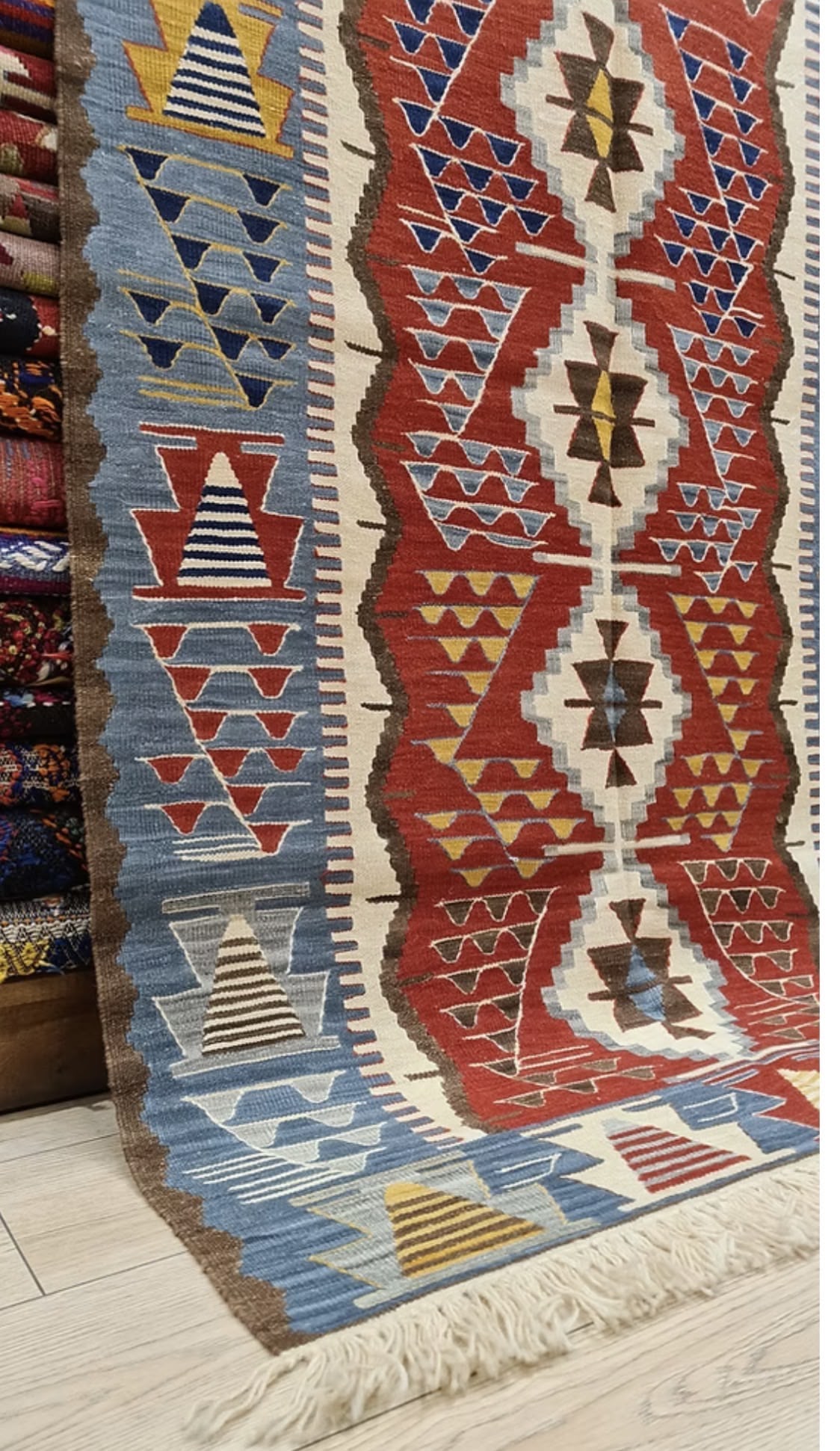 Handwoven Turkish Oushak medium area rug with tribal motifs