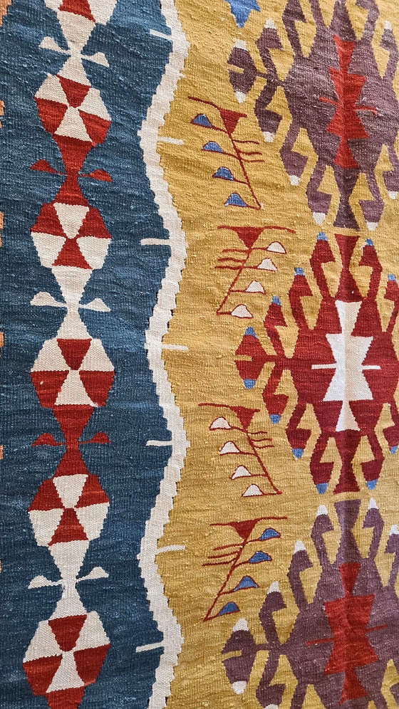 Medium Turkish Ushak handwoven kilim rug 4x6 with geometric motifs in vintage wine, mustard, and blue