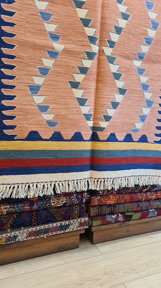 Artisan-crafted Ushak rug with contemporary geometric motifs, representing the blend of tradition and modern design by Kilim Couture New York.