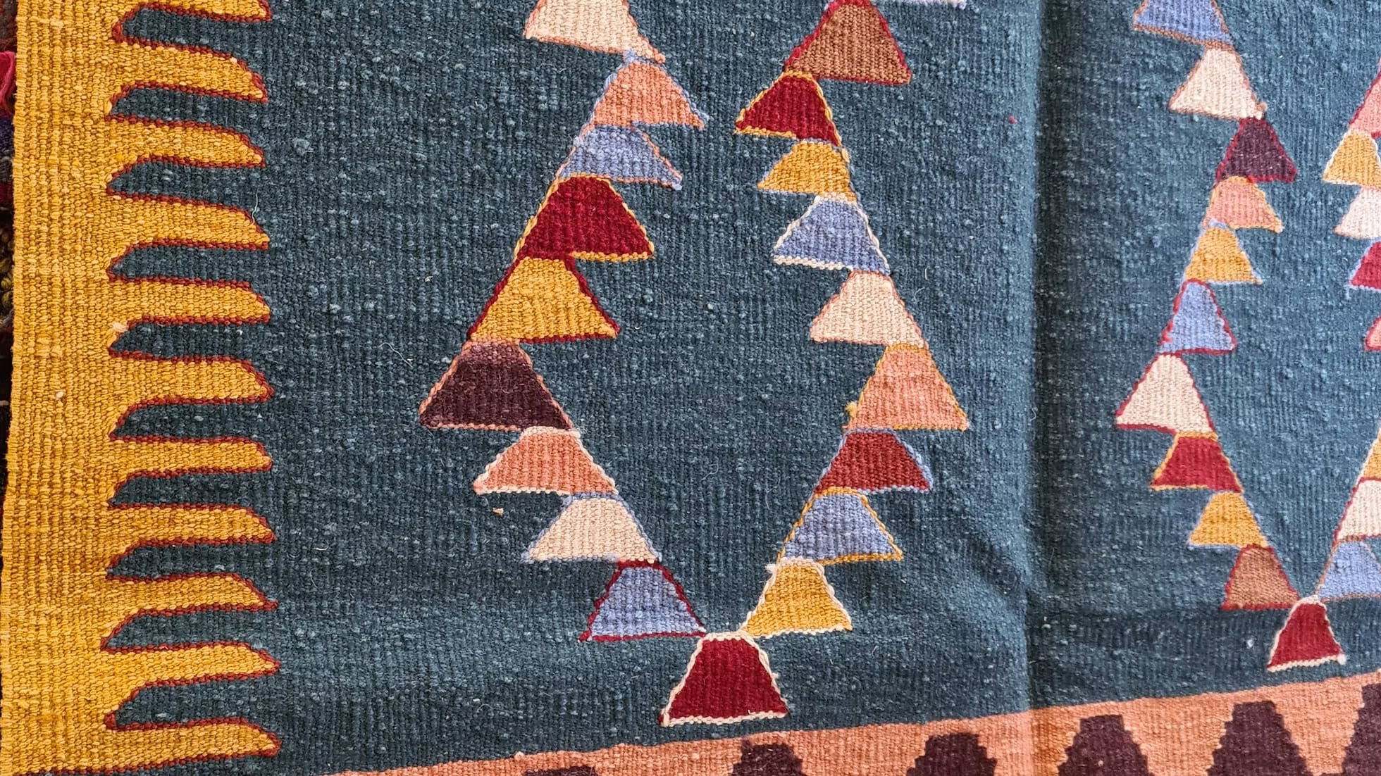 Modern Turkish flat-weave rug from Usak with geometric pattern, artisan handwoven for refined interiors