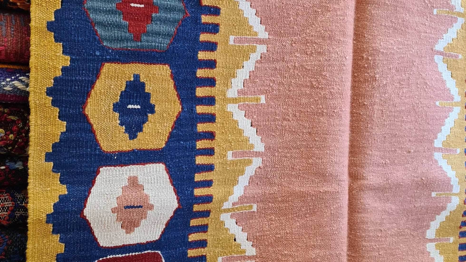 Contemporary Usak kilim rug with Nordic-inspired minimalism, woven in salmon tones with refined border motifs