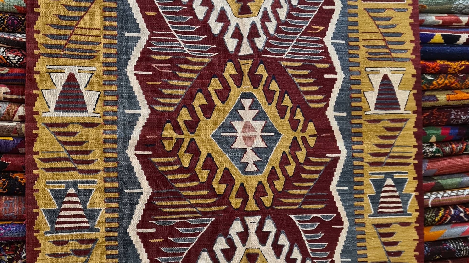 Handwoven Contemporary Turkish Kilim Rug from Uşak, featuring vintage wine and mustard hues.