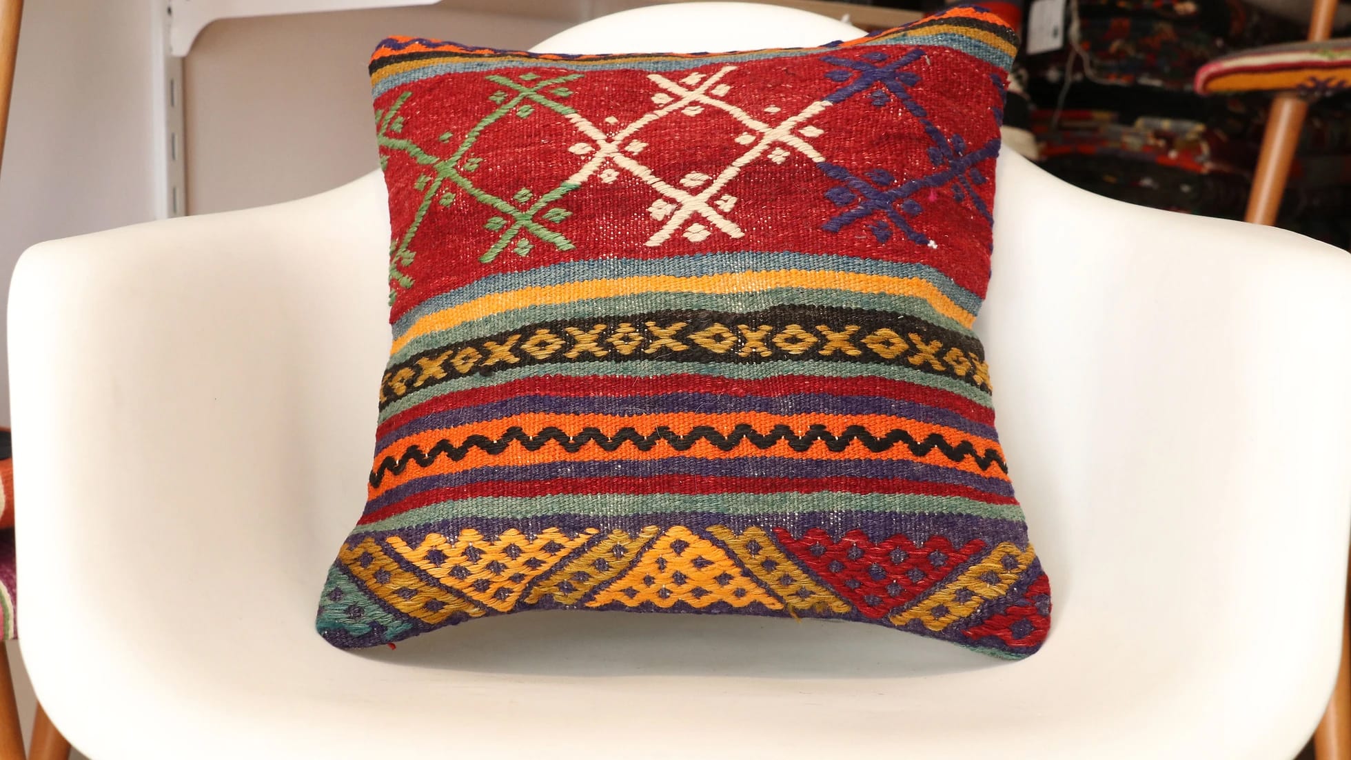 vintage Turkish kilim pillow with tribal motifs