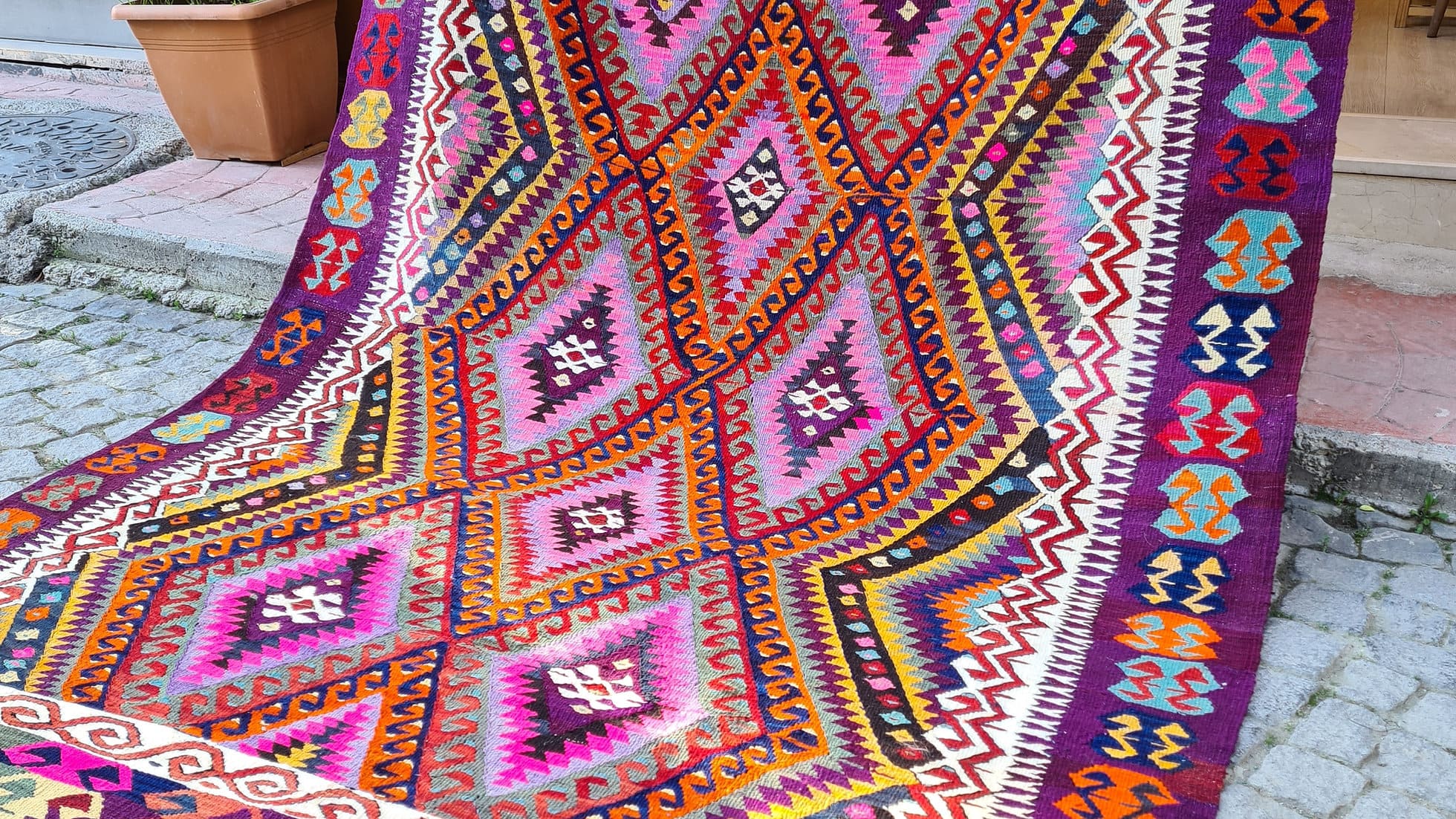 Polychromatic Vintage Turkish Rug with geometric patterns