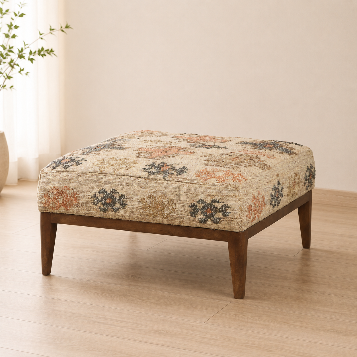 A 32x32 square handcrafted upholstered ottoman with kilim fabric in beige
