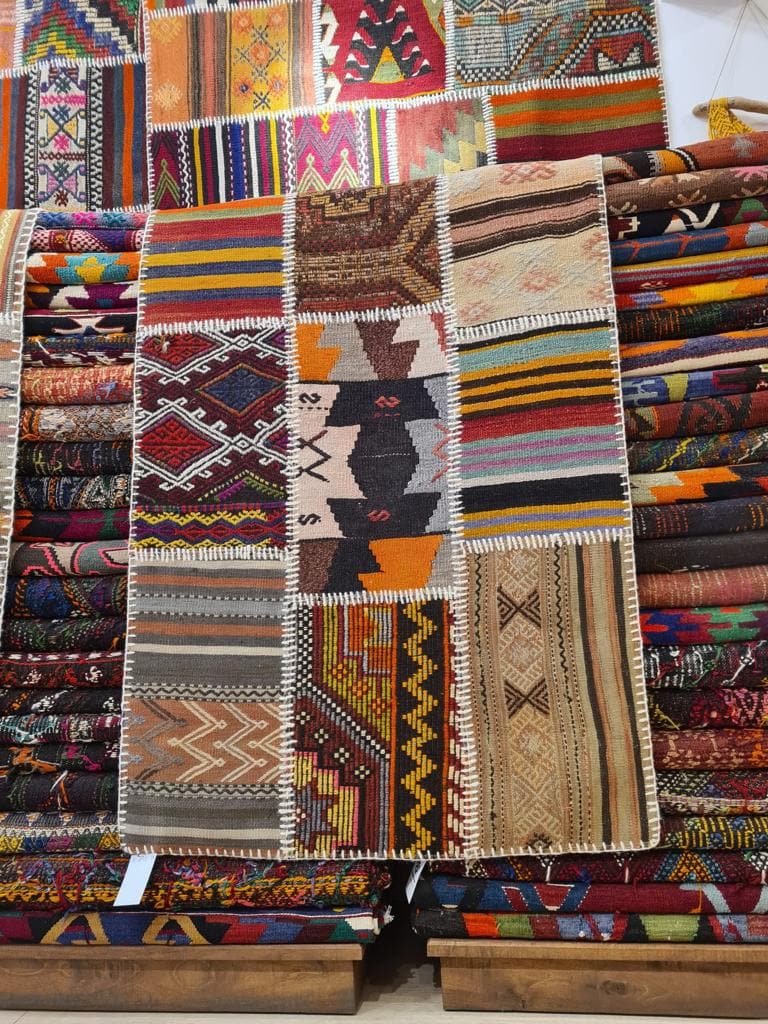 Patchwork antique carpet in vibrant colors and patterns