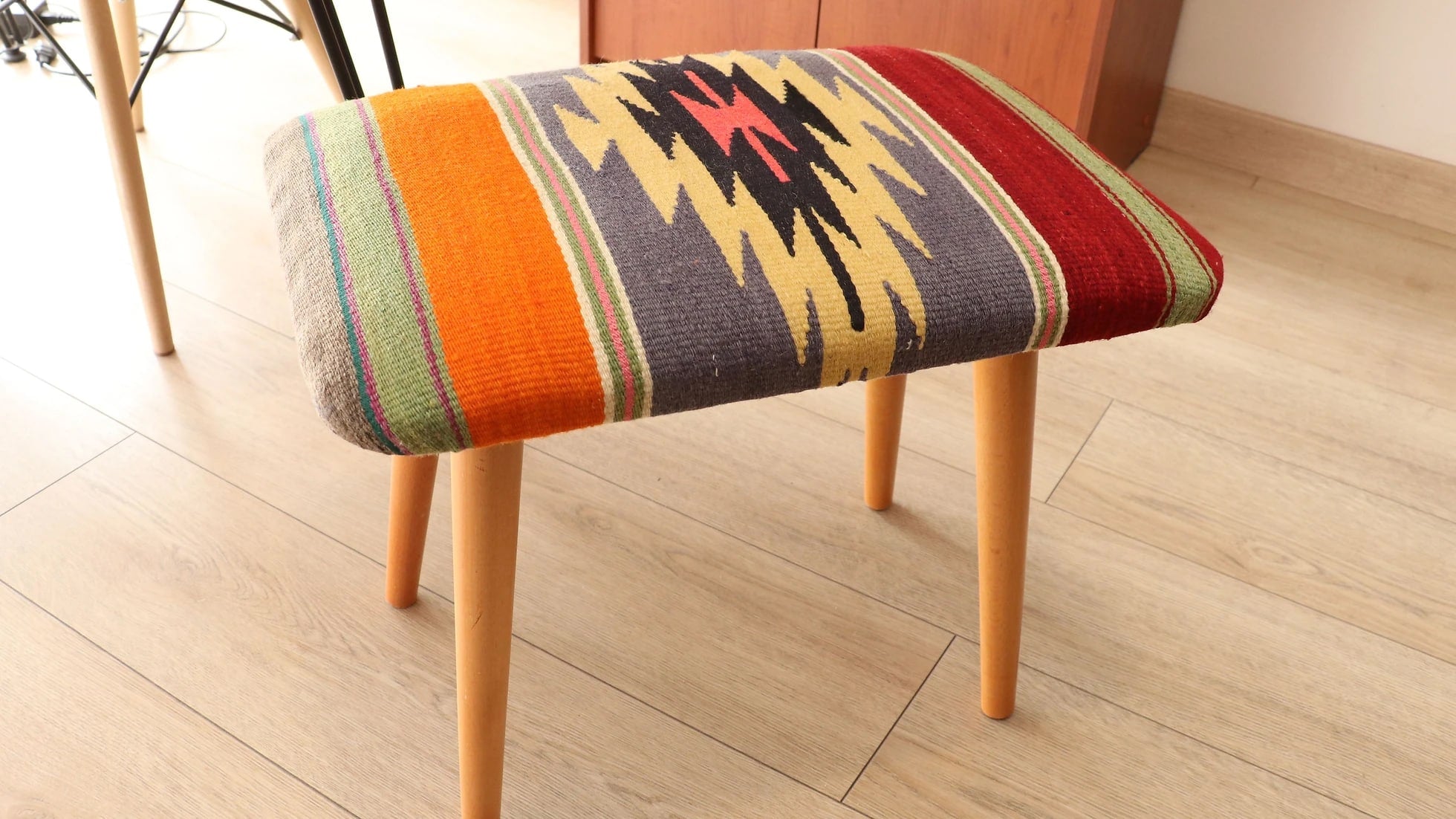 vintage handcrafted upholstered bench made with handwoven vintage kilims and wooden legs