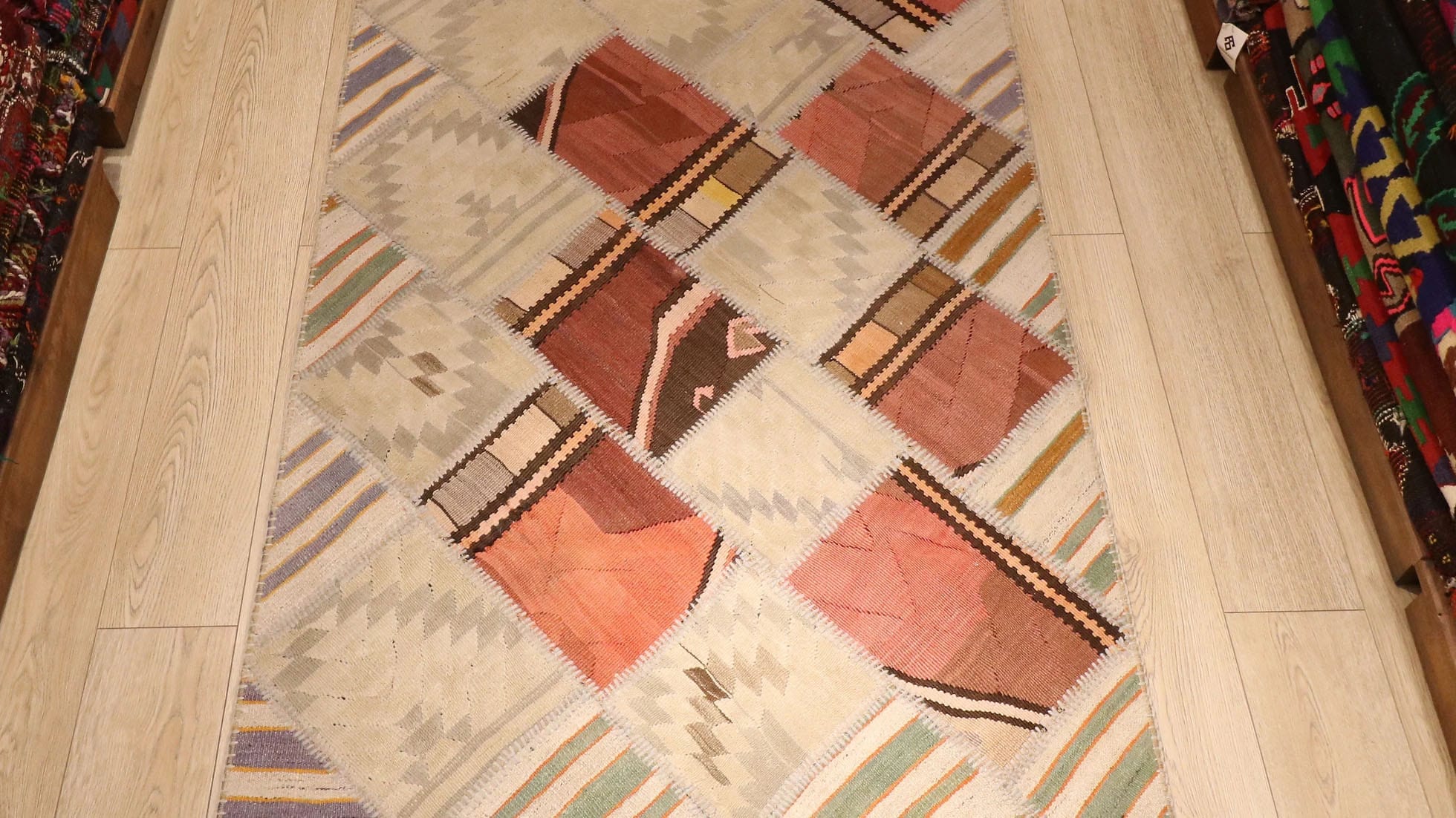 neutral patchwork flat-weave rug in rustic earth tones by Kilim Couture in Manhattan