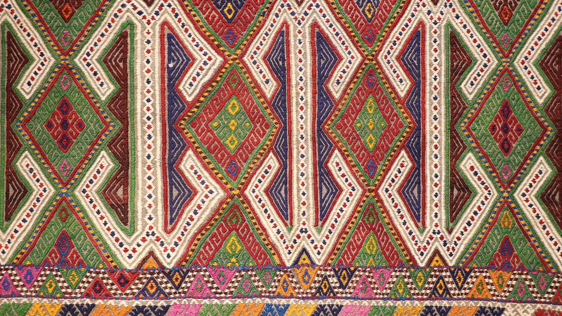 details of one-of-a-kind vintage pastel kilim rug