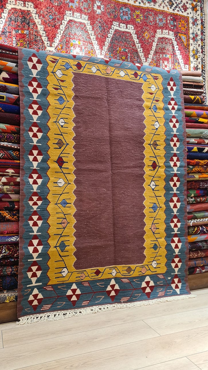 Modern flat-woven medium size Turkish rug with intricate design