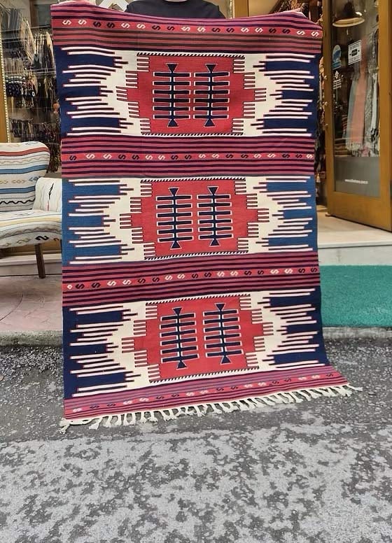 Designer Turkish kilim rug with Navajo-inspired geometry and natural fiber weave