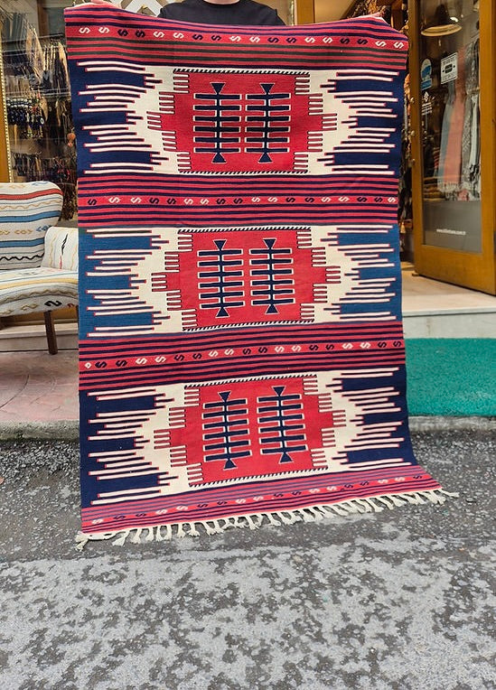 Designer Turkish kilim rug with Navajo-inspired geometry and natural fiber weave