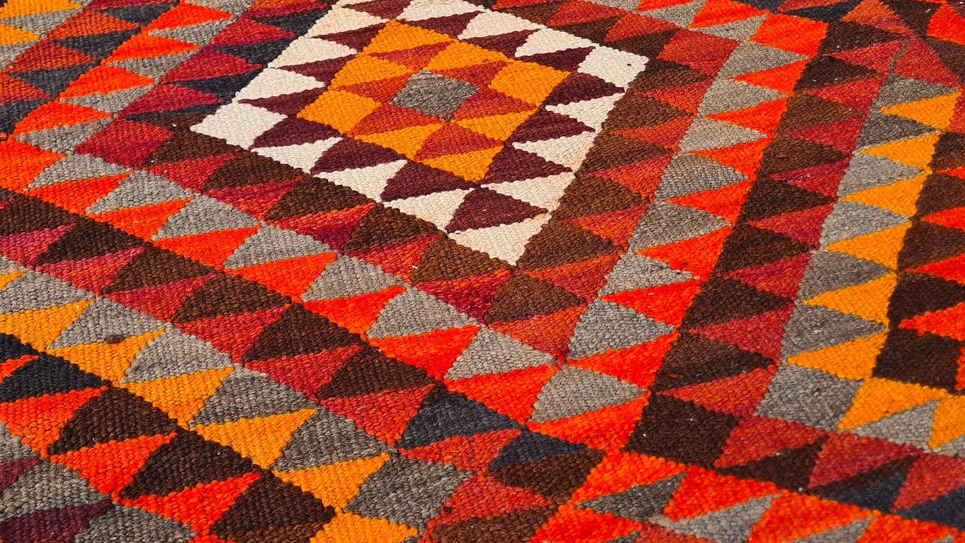 Artisan-made Afghan runner, 3x12 ft, featuring a bold diamond flat-weave design in vermilion red, persimmon orange, and ochre yellow. Durable and versatile, ideal for hallways, kitchens, or entryways, blending tradition with modern style.