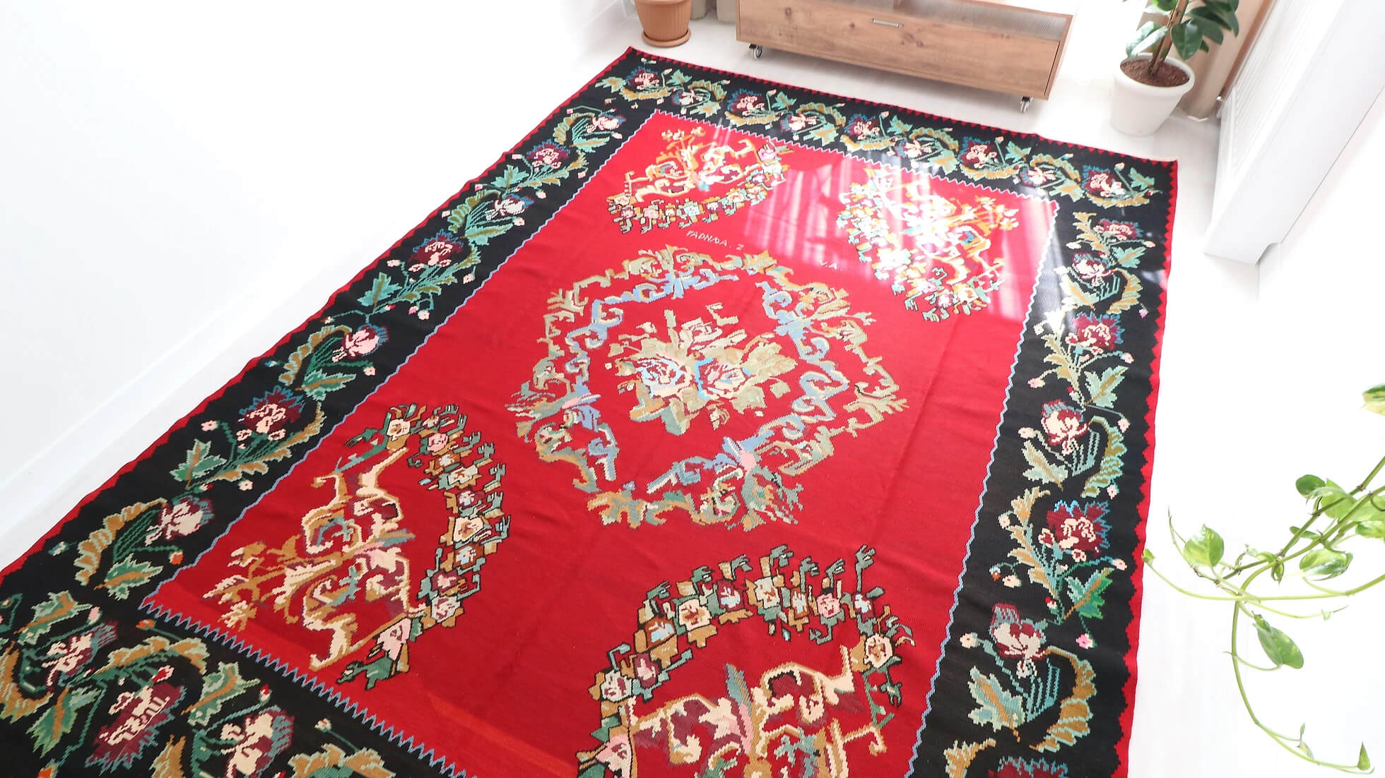 Vintage Handwoven Bessarabian Kilim Rug in red shades with floral design signed by the artisan