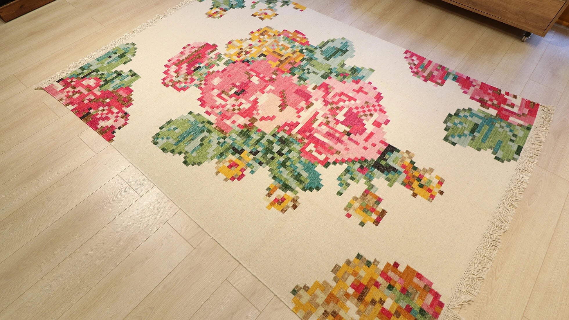 contemporary caucasian karabagh kilim rug from turkey in pastel colors and beige background in floral style and pixelated vintage look