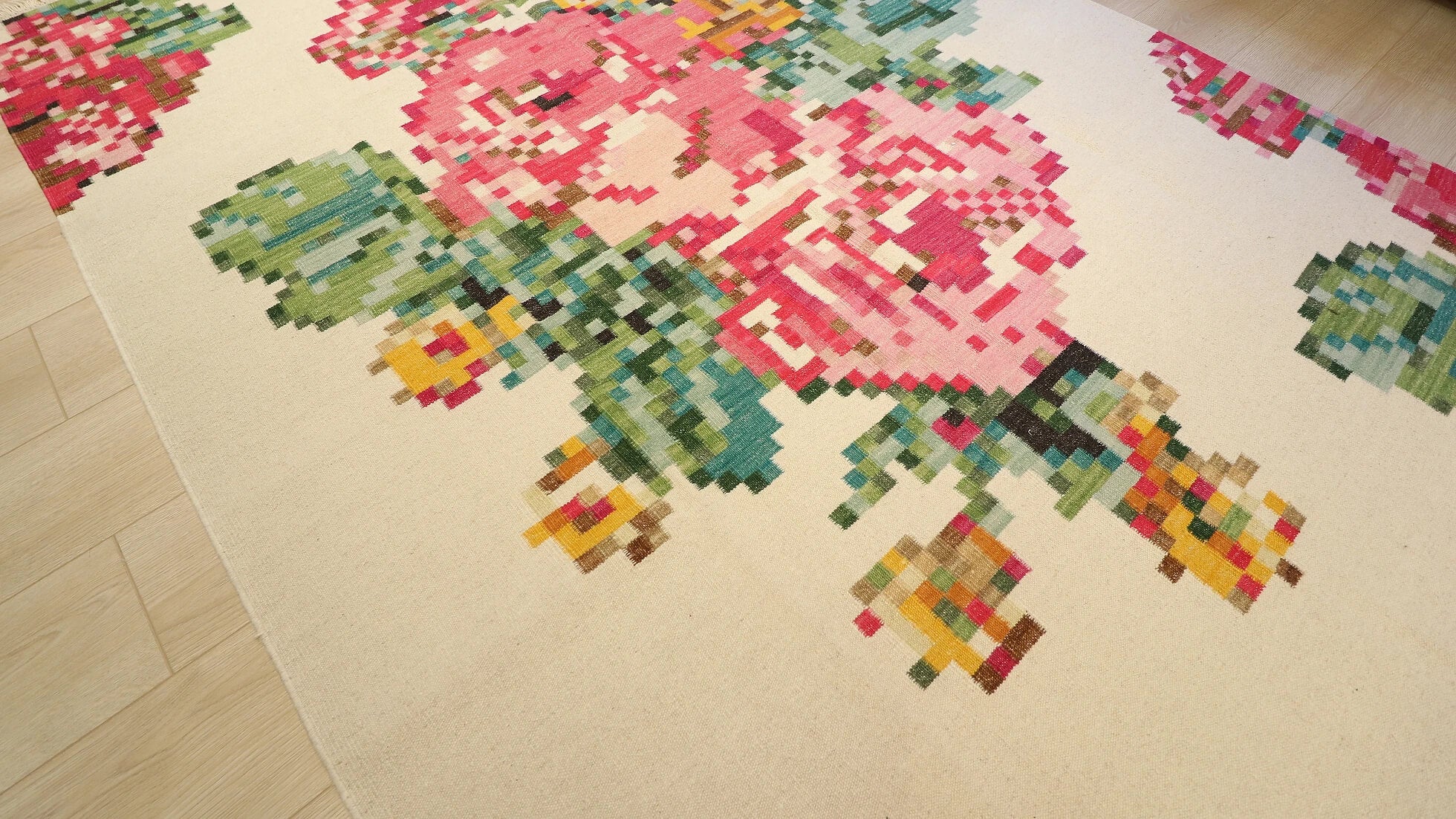 contemporary caucasian karabagh kilim rug from turkey in pastel colors and beige background in floral style and pixelated vintage look