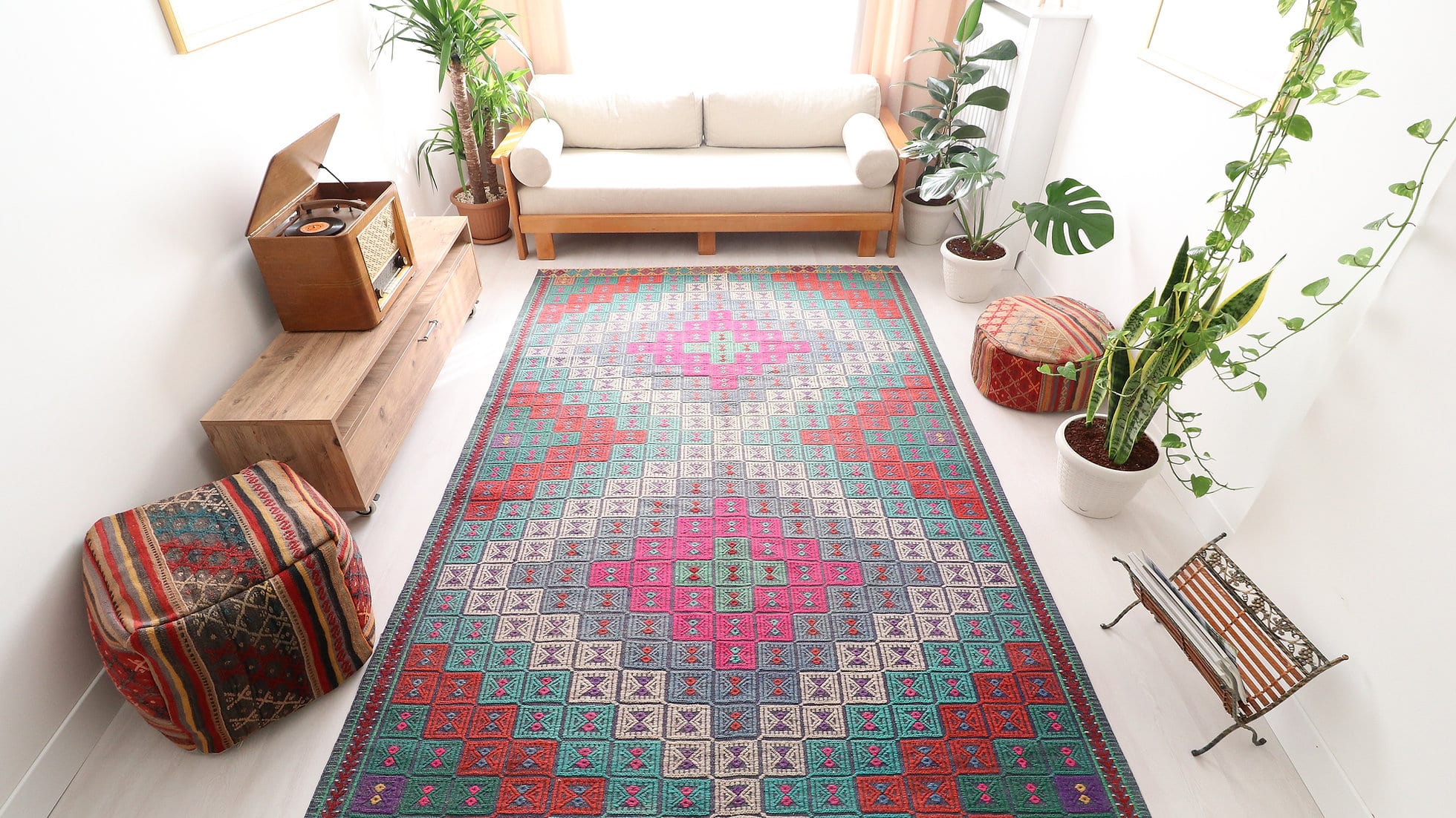 Vintage hand woven Cecim Kilim Rug with faded hues in pink, red and green