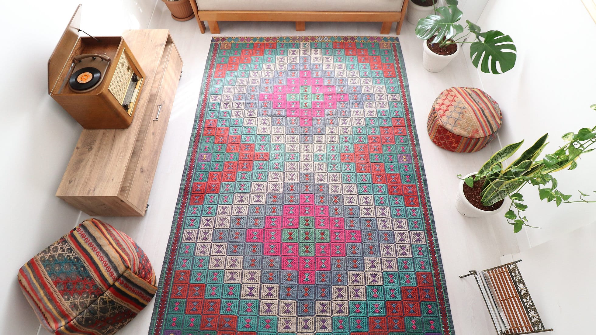 Vintage hand woven Cecim Kilim Rug with faded hues in pink, red and green