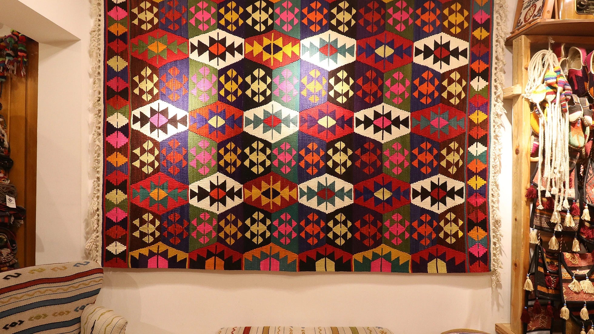 handmade Denizli tribal kilim rug on the wall
