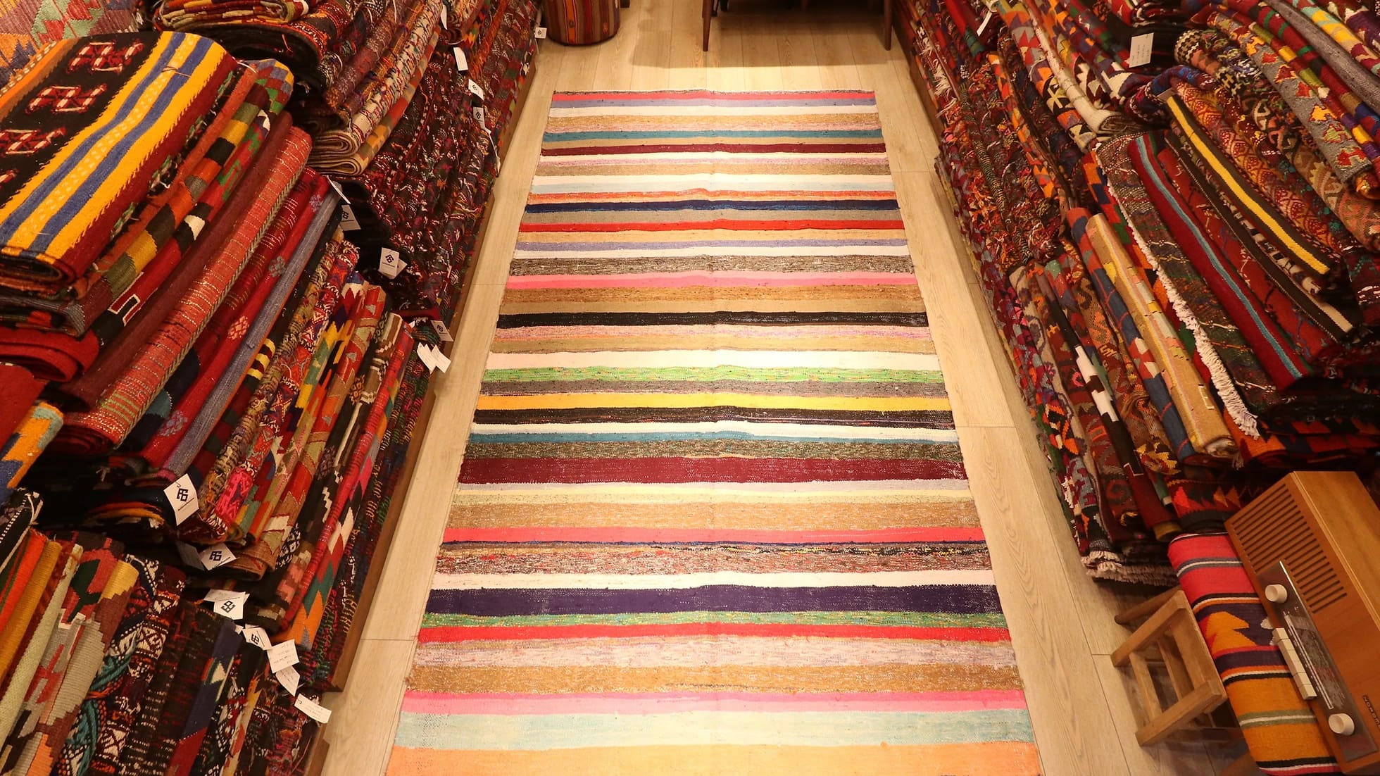handwoven neutral flat-weave rug with stripe patterns