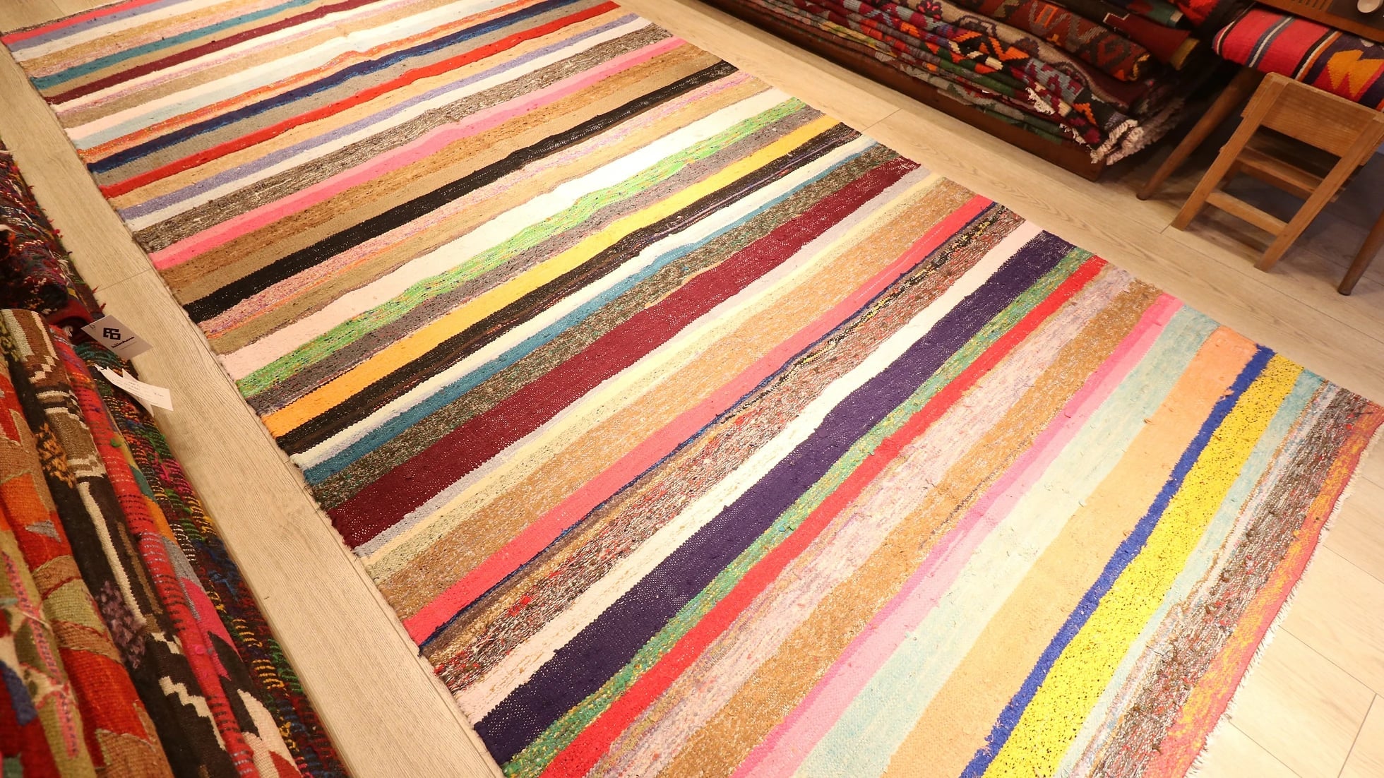 hand-knotted neutral flat-weave rug with stripe patterns