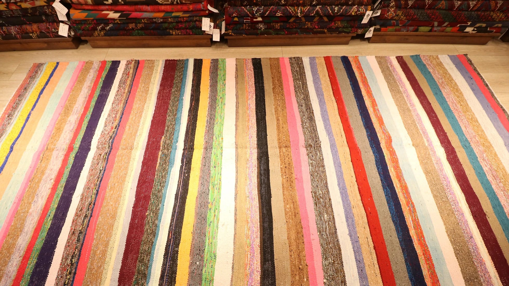 hand-knotted neutral flat-weave rug with stripe patterns