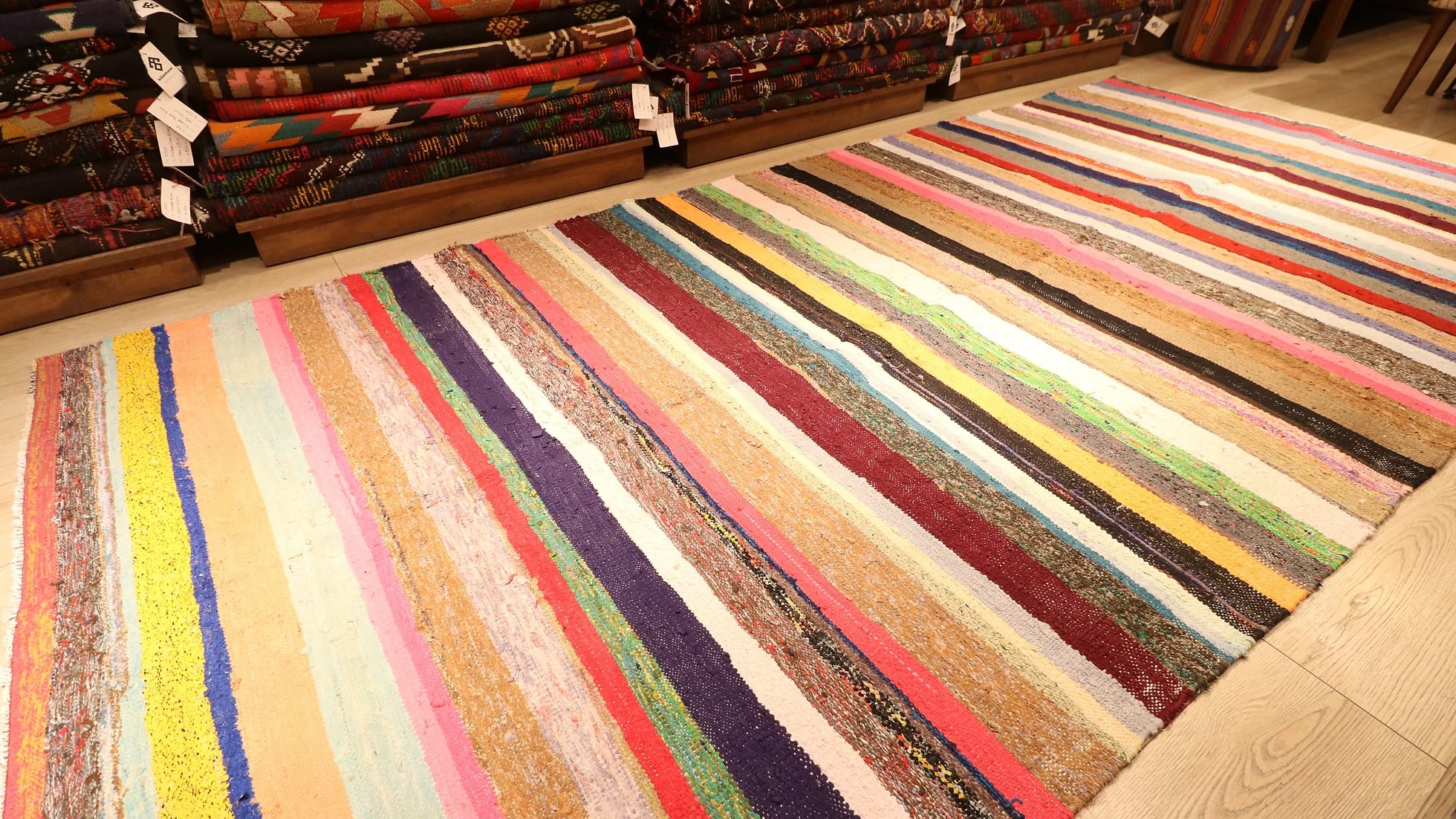 hand-knotted neutral flat-weave rug with stripe patterns
