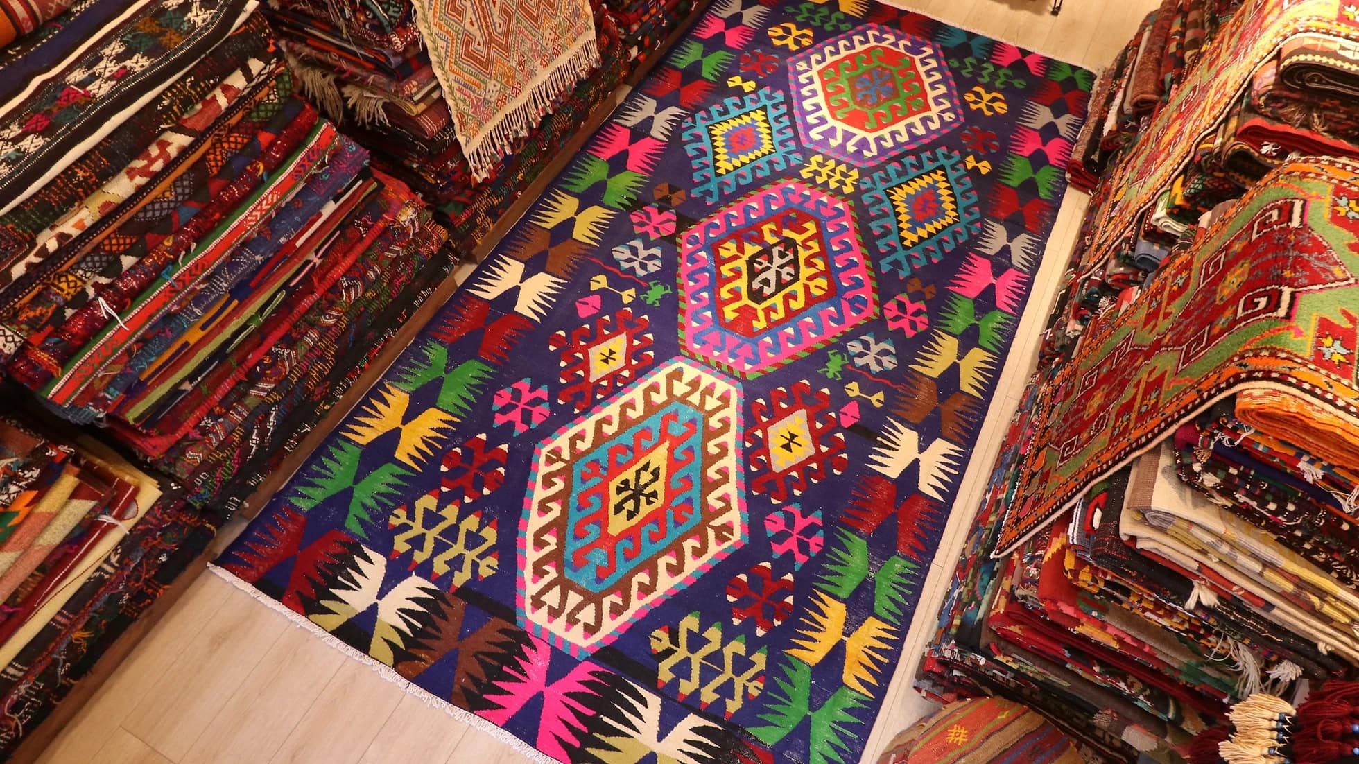 vintage handwoven cal denizli kilim rug with multicolored geometric patterns and distinctive motifs