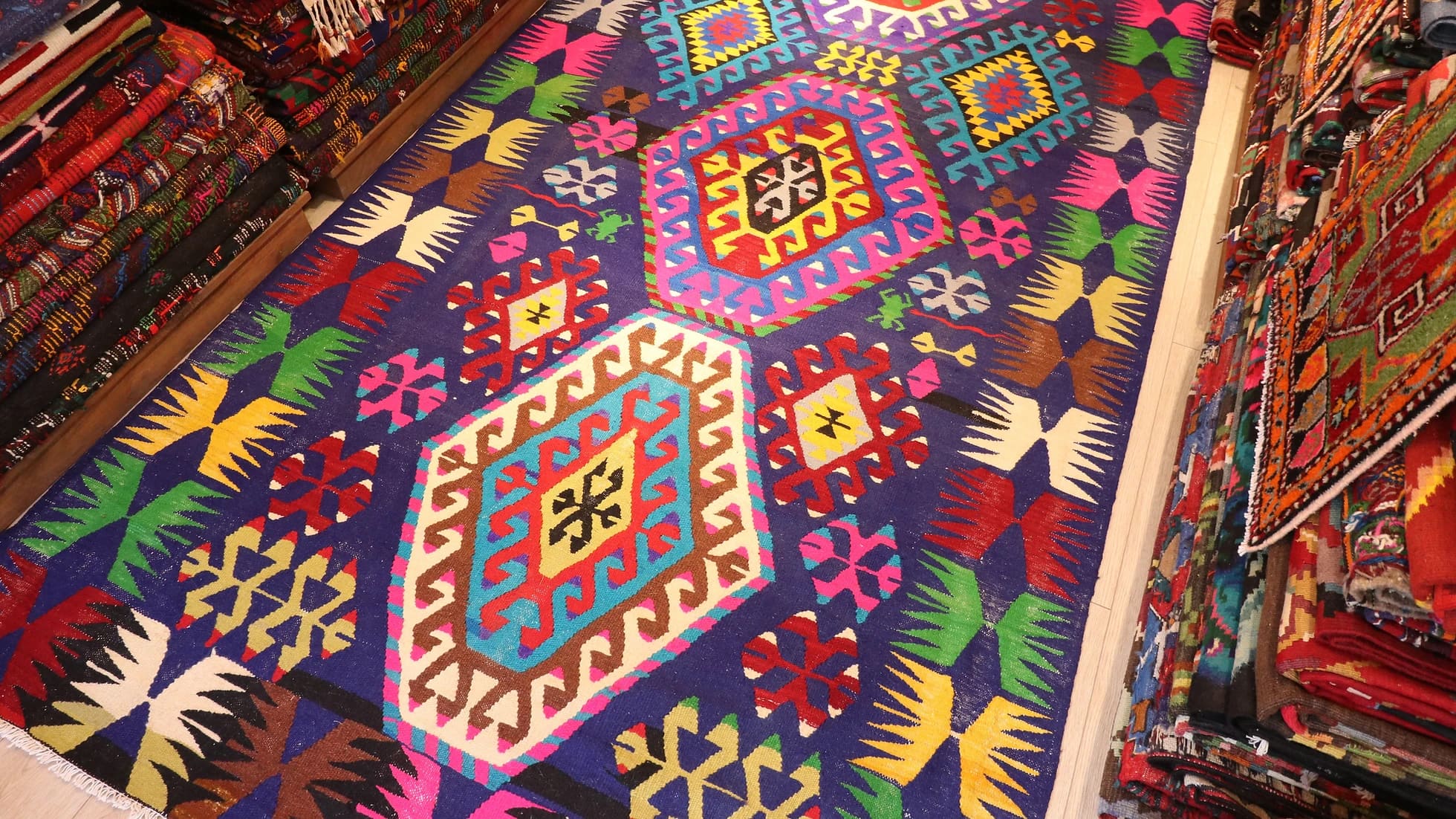 vintage handwoven cal denizli kilim rug with multicolored geometric patterns and distinctive motifs
