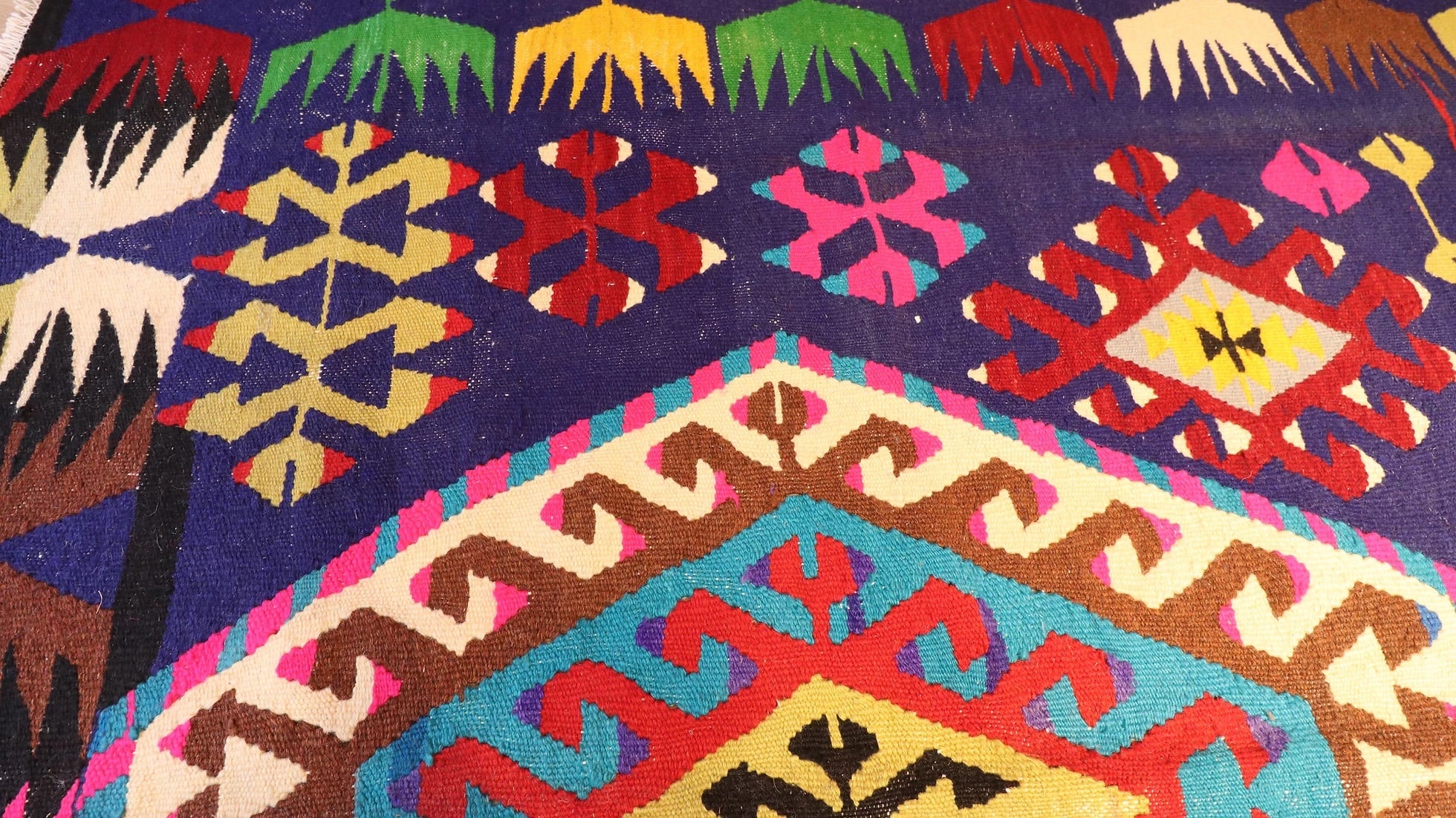 vintage handwoven cal denizli kilim rug with multicolored geometric patterns and distinctive motifs