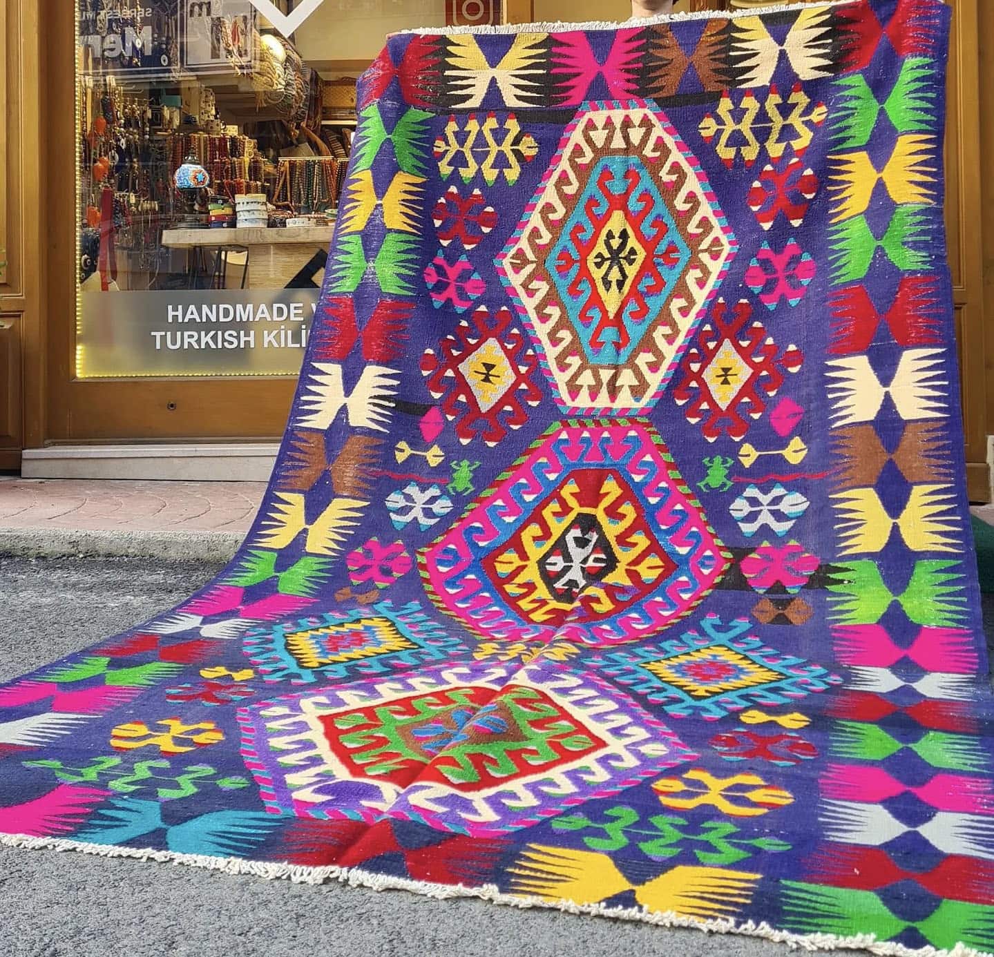 vintage handwoven cal denizli kilim rug with multicolored geometric patterns and distinctive motifs