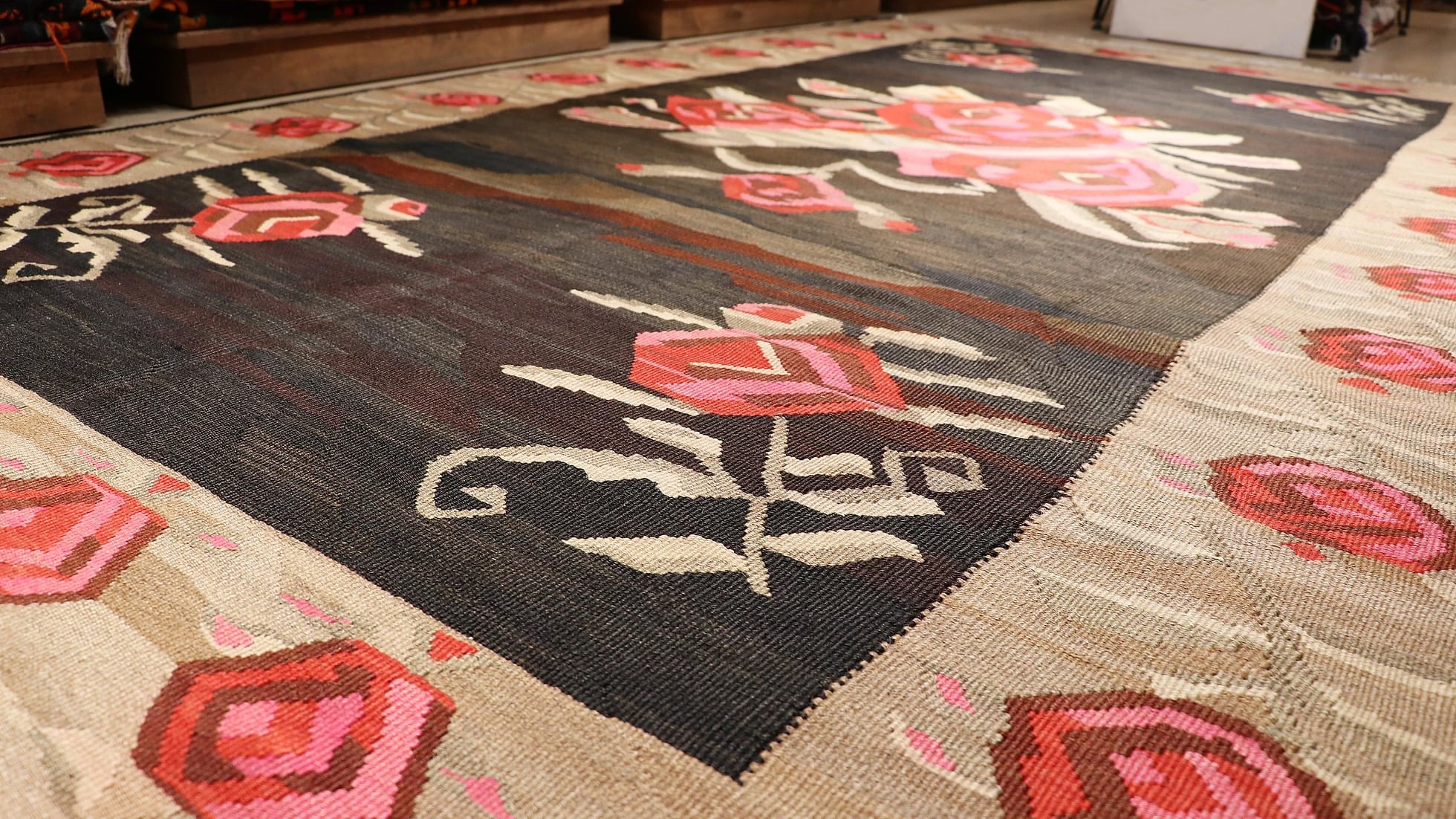 vintage hand-knotted Turkish Kars Karabakh floral tapestry in earthy brown and red tones with rose motifs and a very ancient look