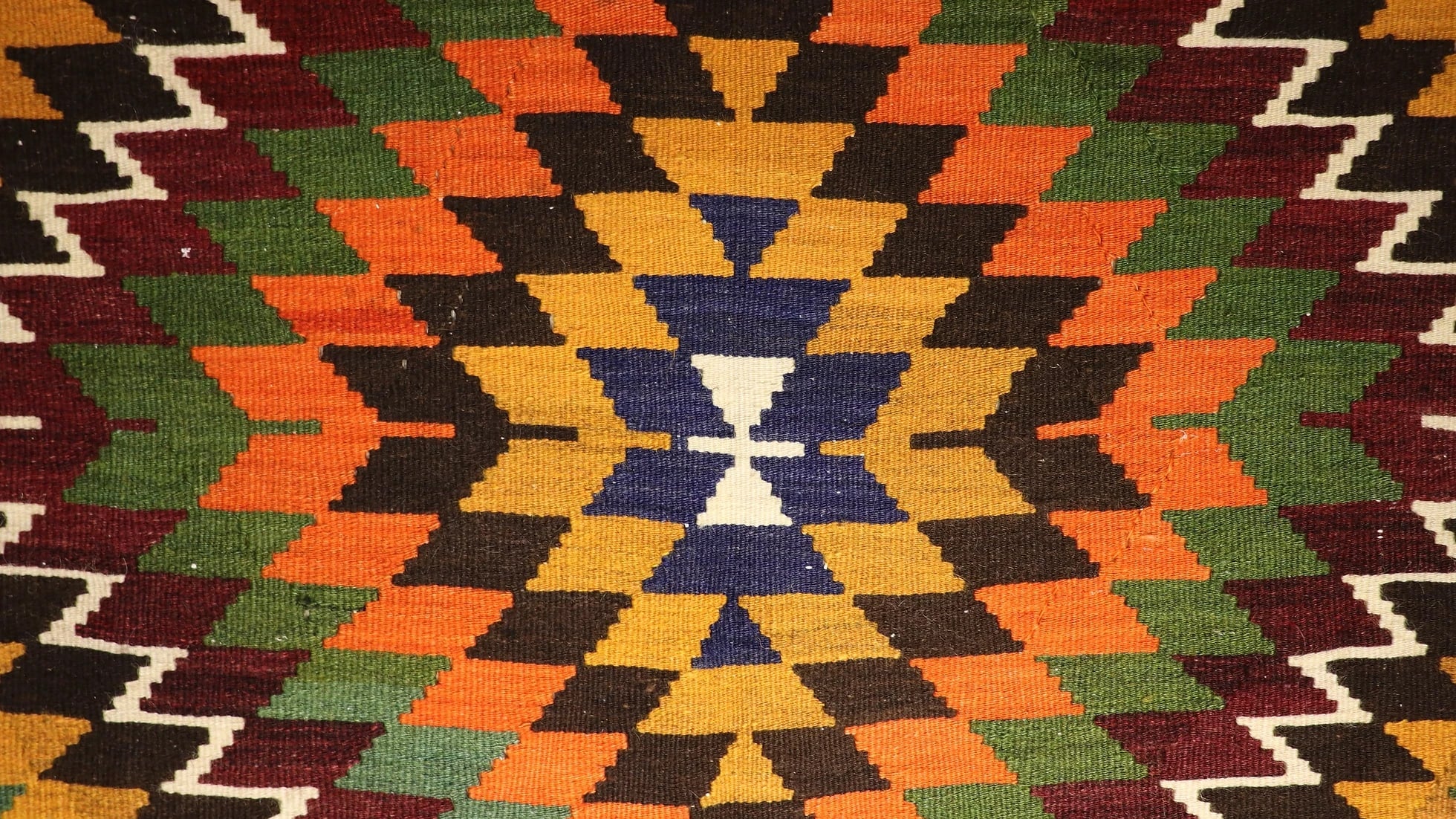 Diamond patterned Turkish kilim rug in orange in detail