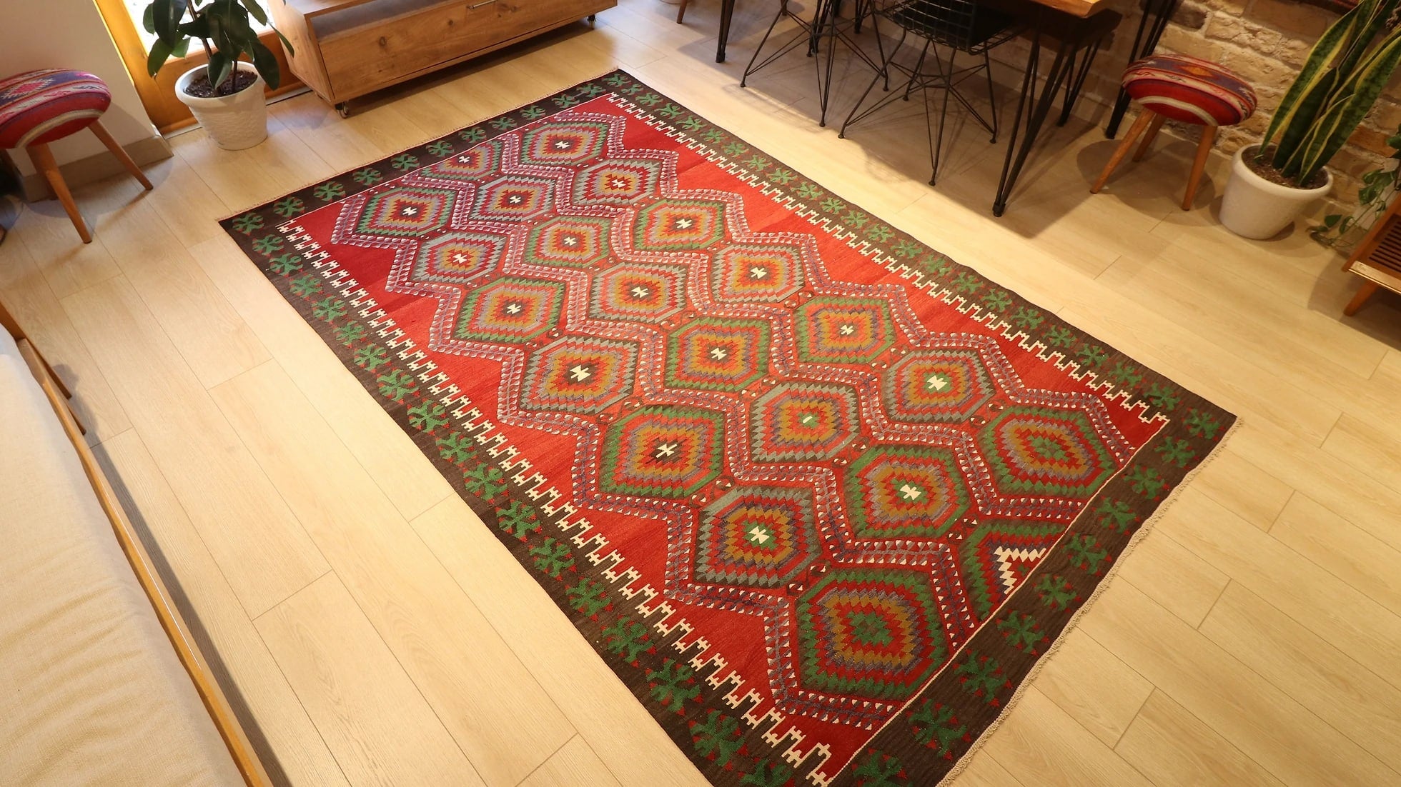 transitional and eclectic premium Oushak Esme rug is displayed in a beautiful living room