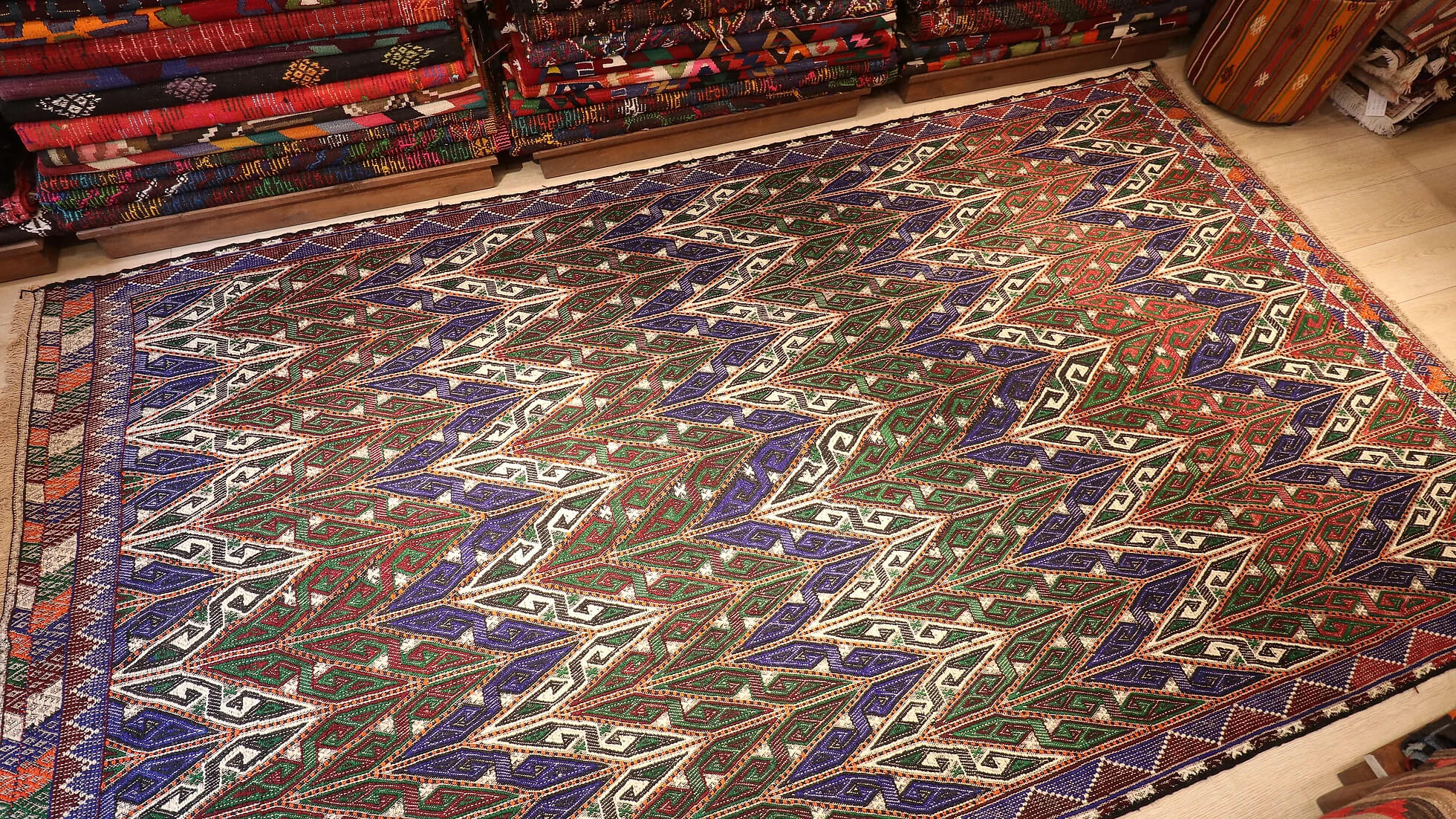 Vintage embroidered luxury Turkish cecim rug in violet and green with zigzag patterns