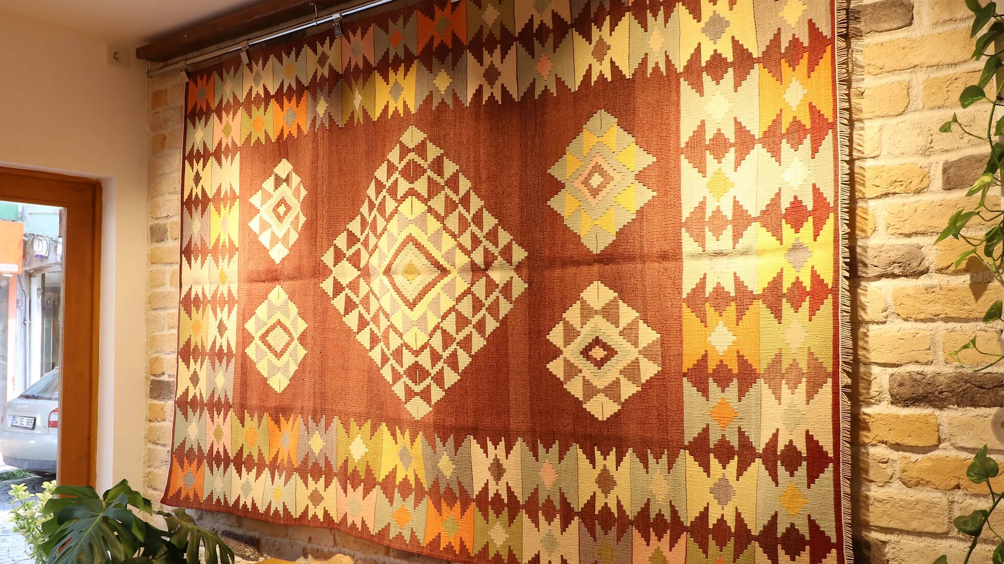 tribal hand-knotted accent area rug in traditional Anatolian patterns measuring 5x8 ft