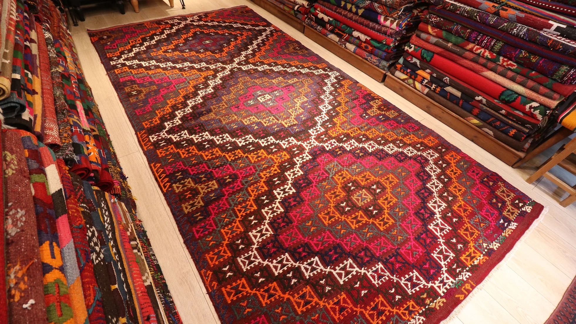 room-sized vintage mid-century Turkish cicim flat-weave runner rug in diamond patterns and pastel earthy colors