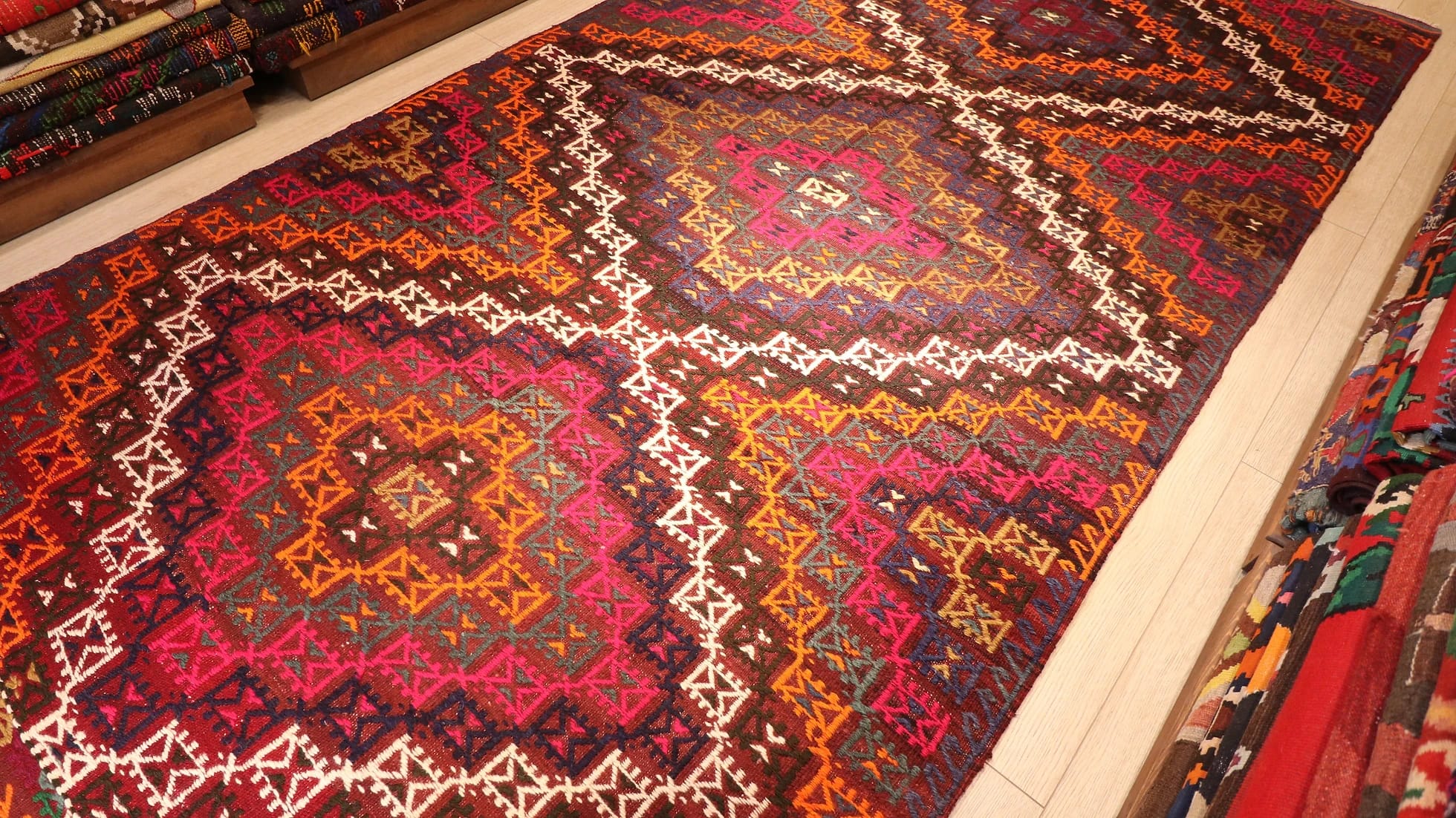 room-sized vintage mid-century Turkish cicim flat-weave runner rug in diamond patterns and pastel earthy colors