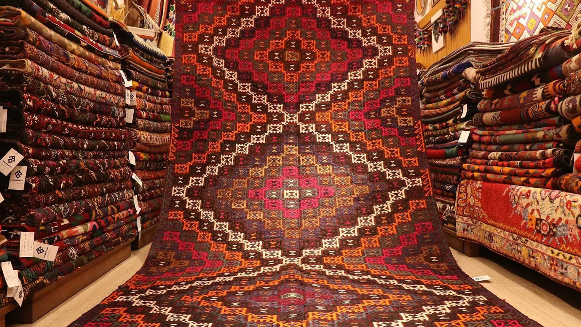 room-sized vintage mid-century Turkish cicim flat-weave runner rug in diamond patterns and pastel earthy colors