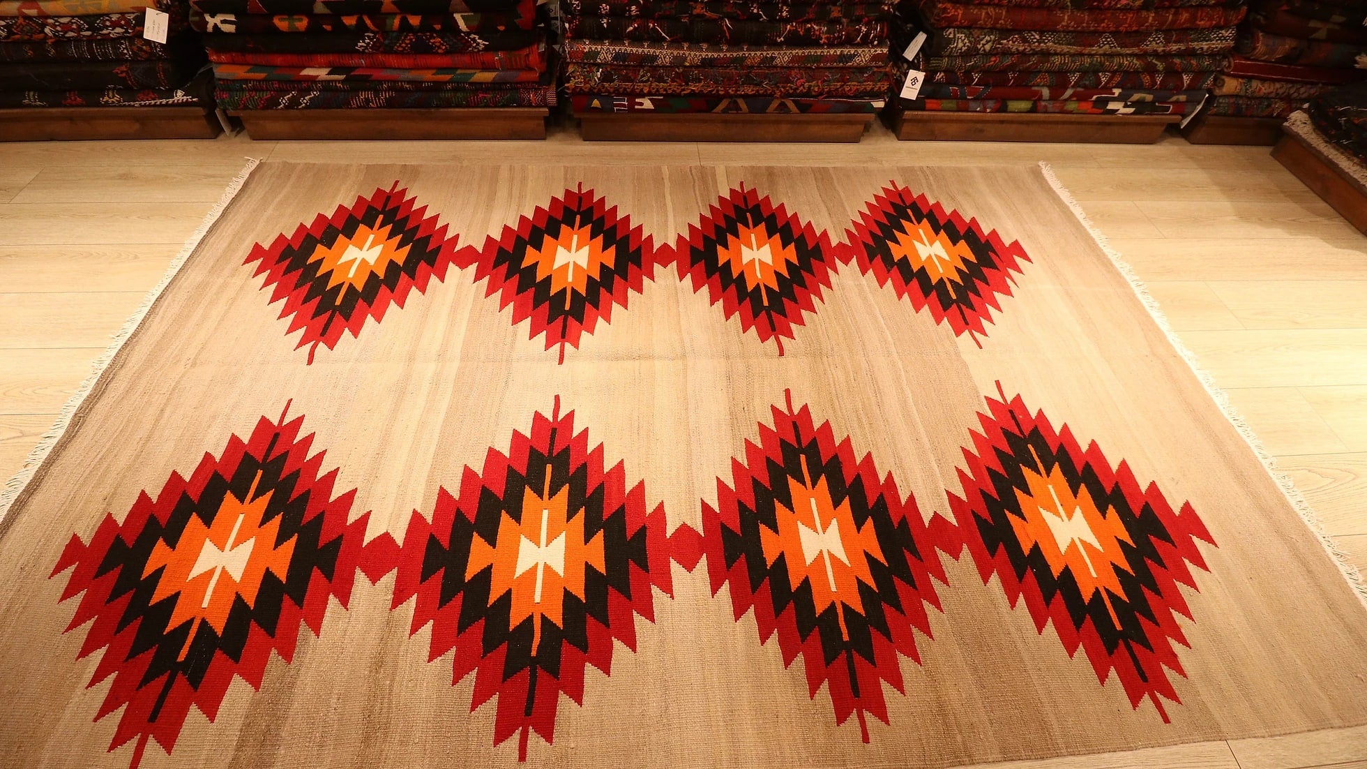 Handwoven Neutral Tribal Turkish Kilim Rug with red and orange lozenge patterns in beige