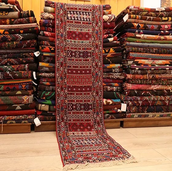 vintage hand-knotted Persian wool runner in red by Kilim Couture NYC
