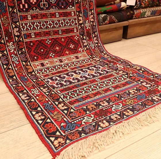 vintage hand-knotted Persian oriental rug in rustic tones by Kilim Couture New York Rug Gallery