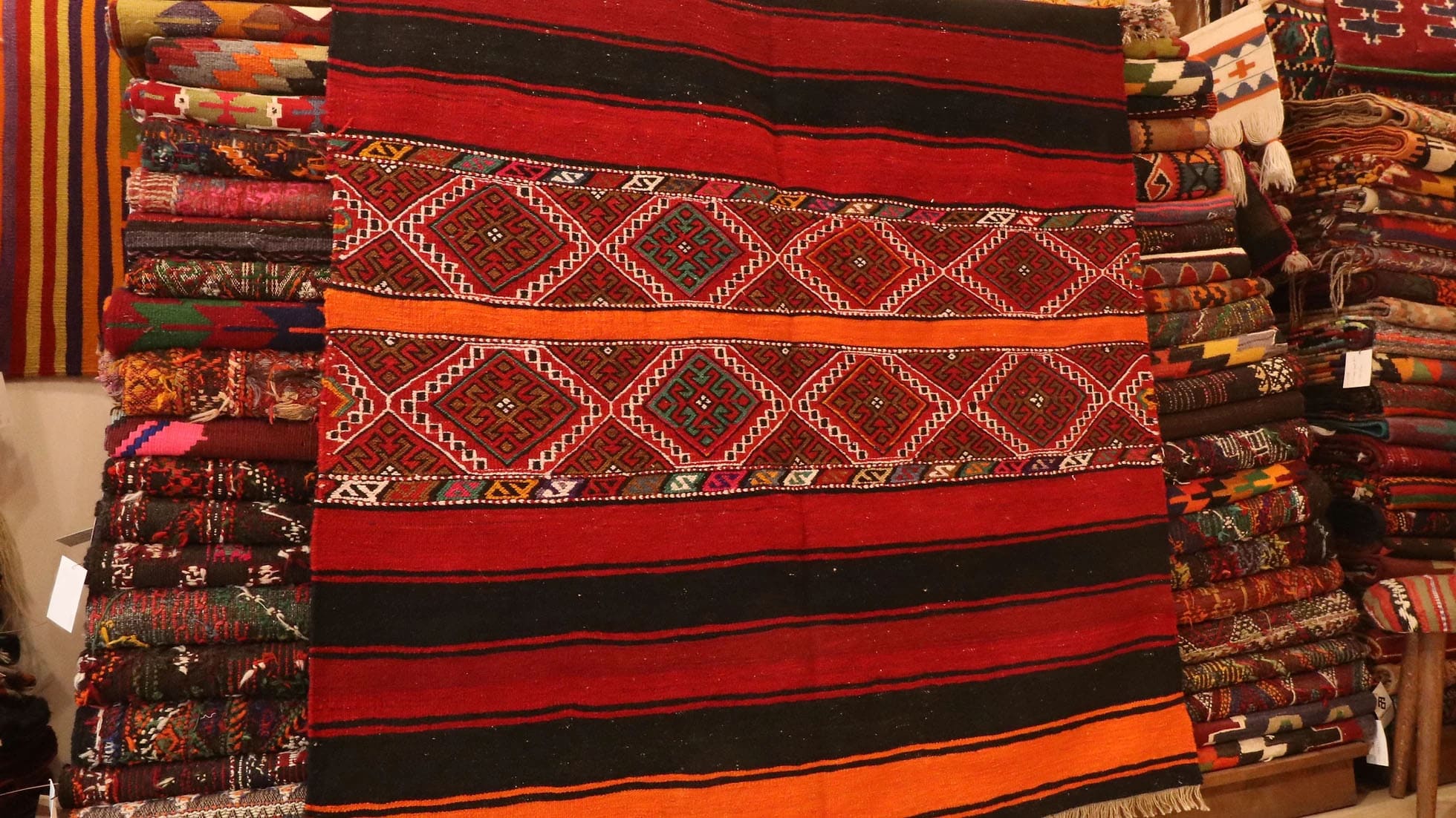 vintage traditional Turkish zili cuval flat rug in tribal motifs and vibrant colors